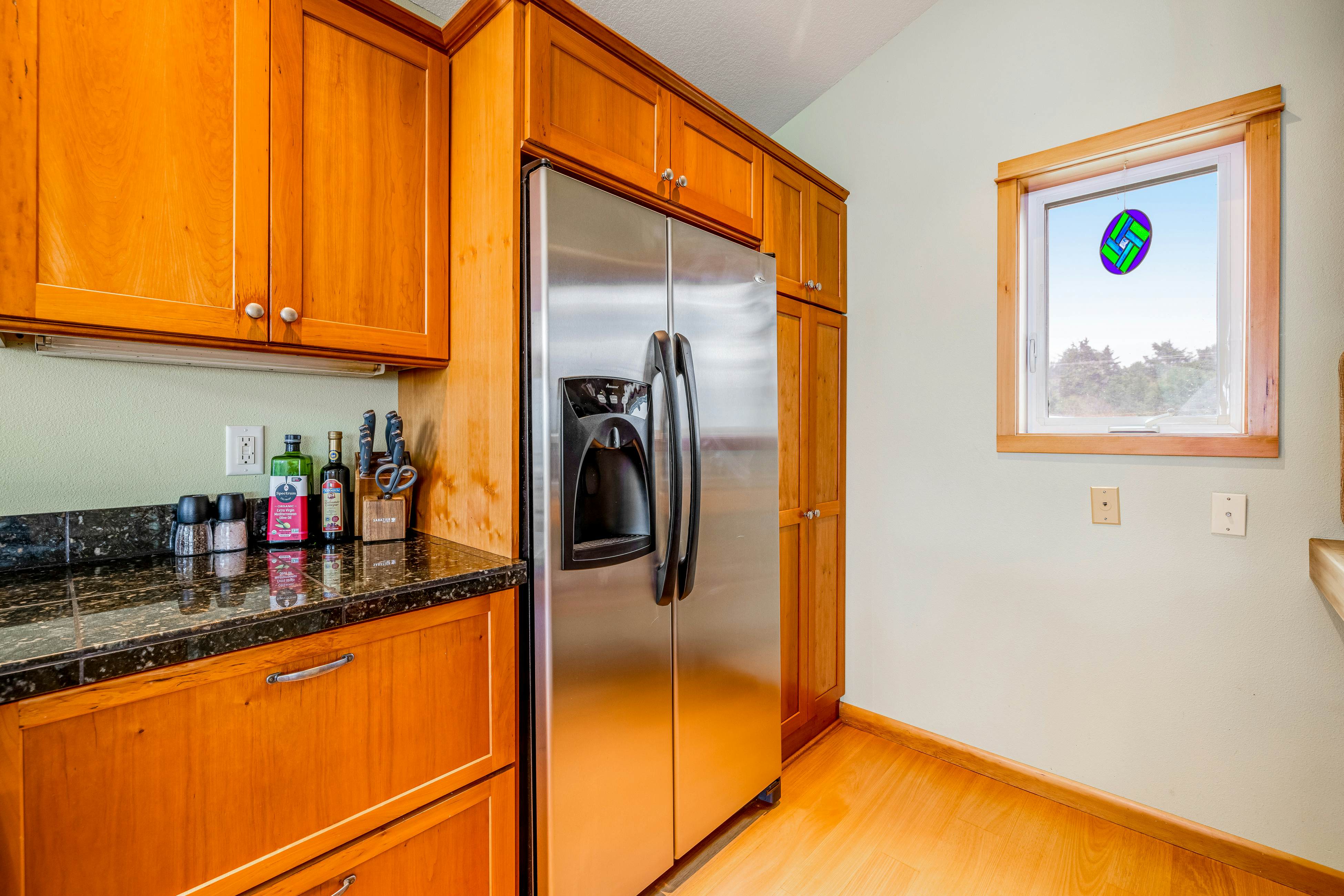 Lakefront escape with water views, grill, wrap-around deck - walk to beach