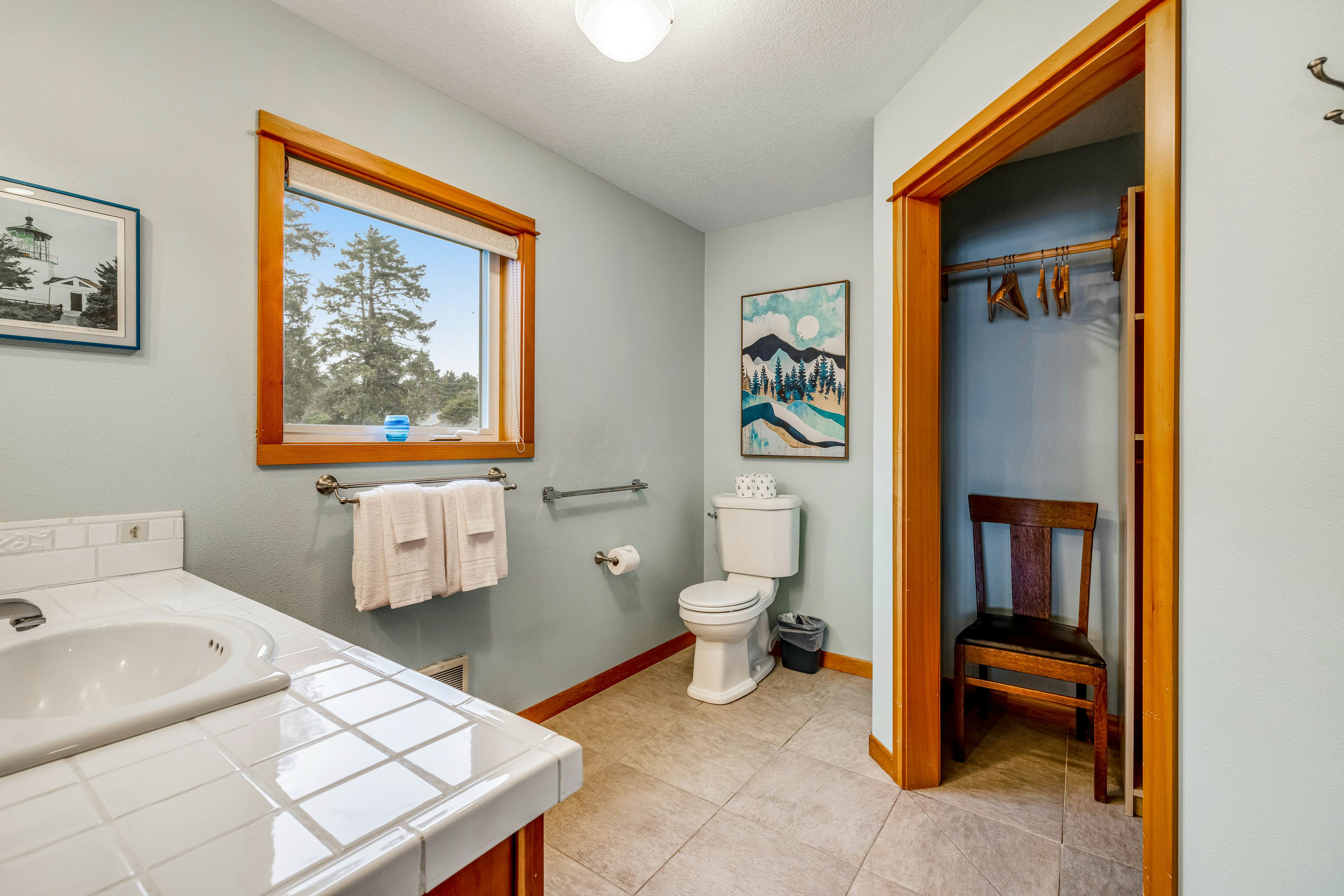 Lakefront escape with water views, grill, wrap-around deck - walk to beach