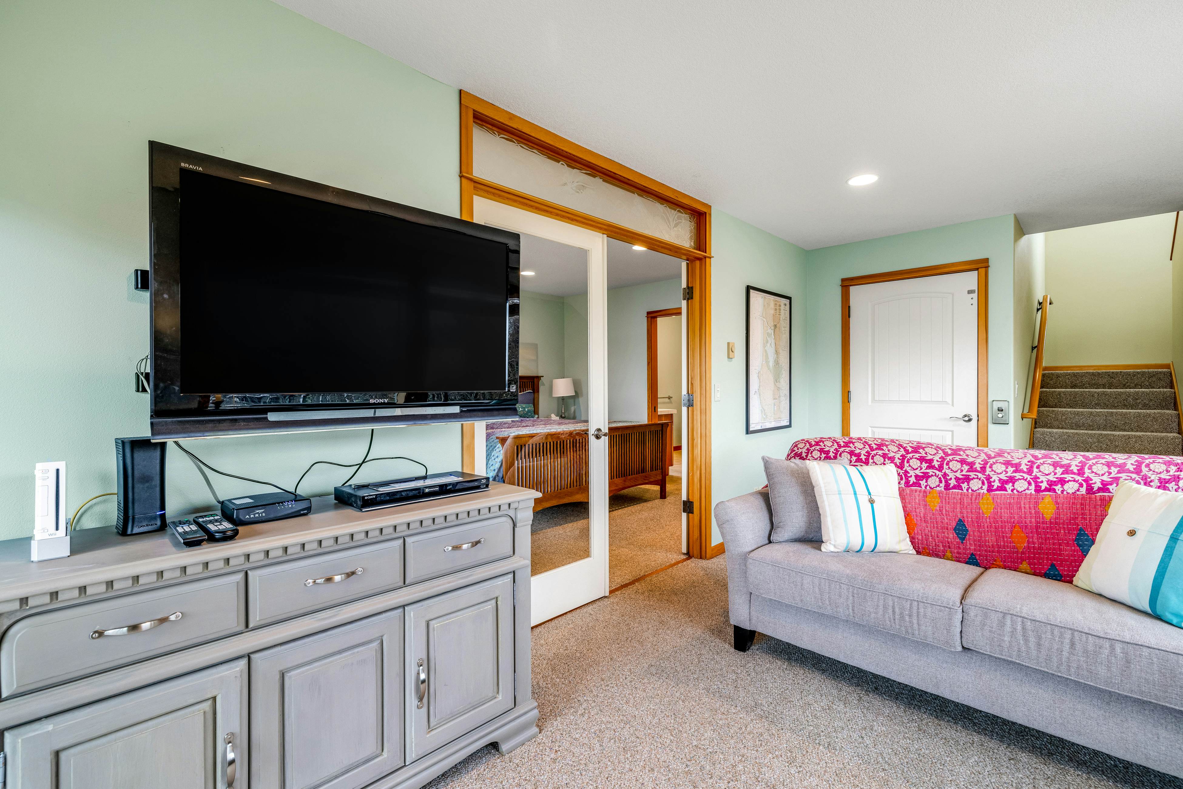 Lakefront escape with water views, grill, wrap-around deck - walk to beach