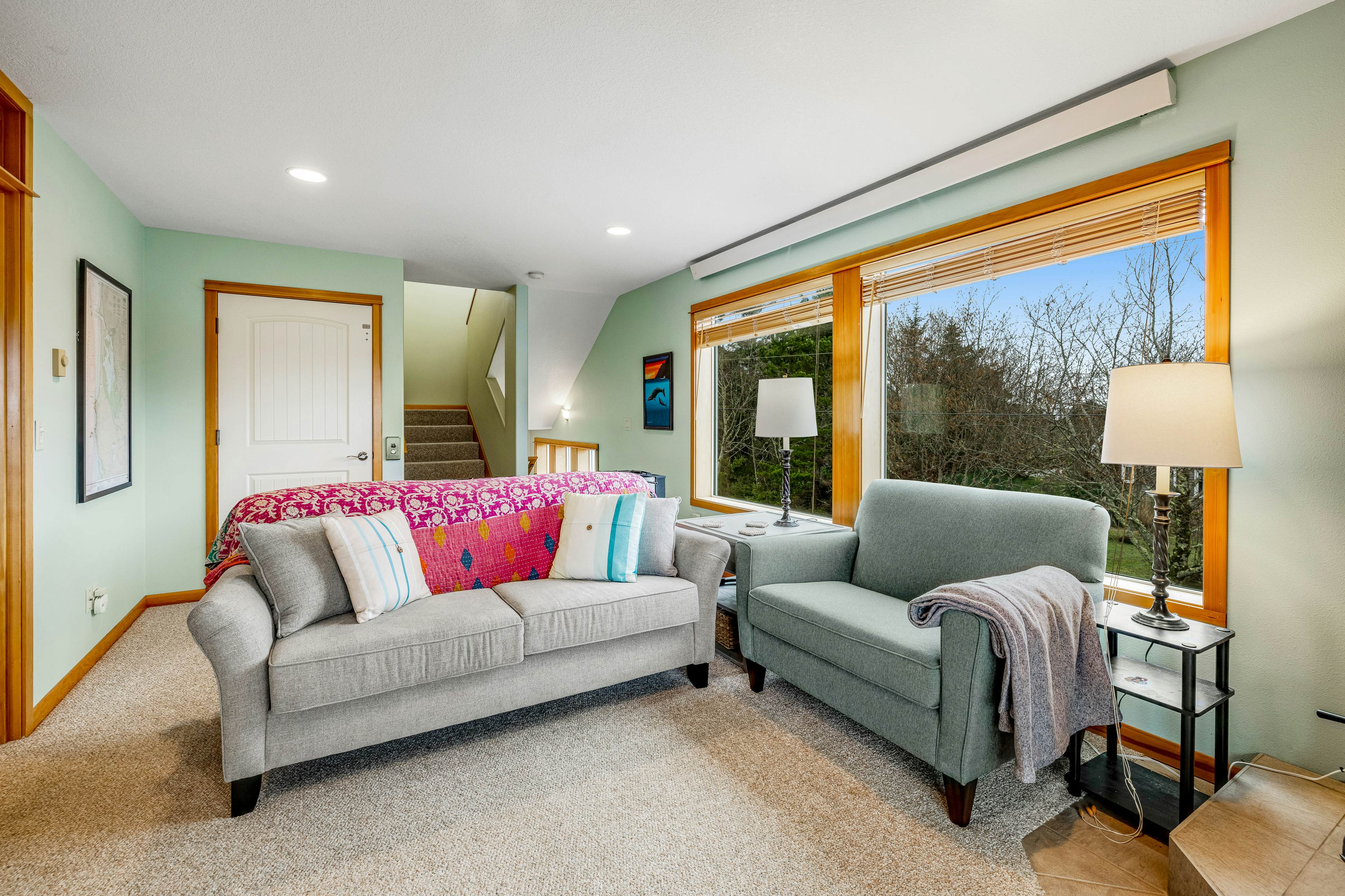 Lakefront escape with water views, grill, wrap-around deck - walk to beach