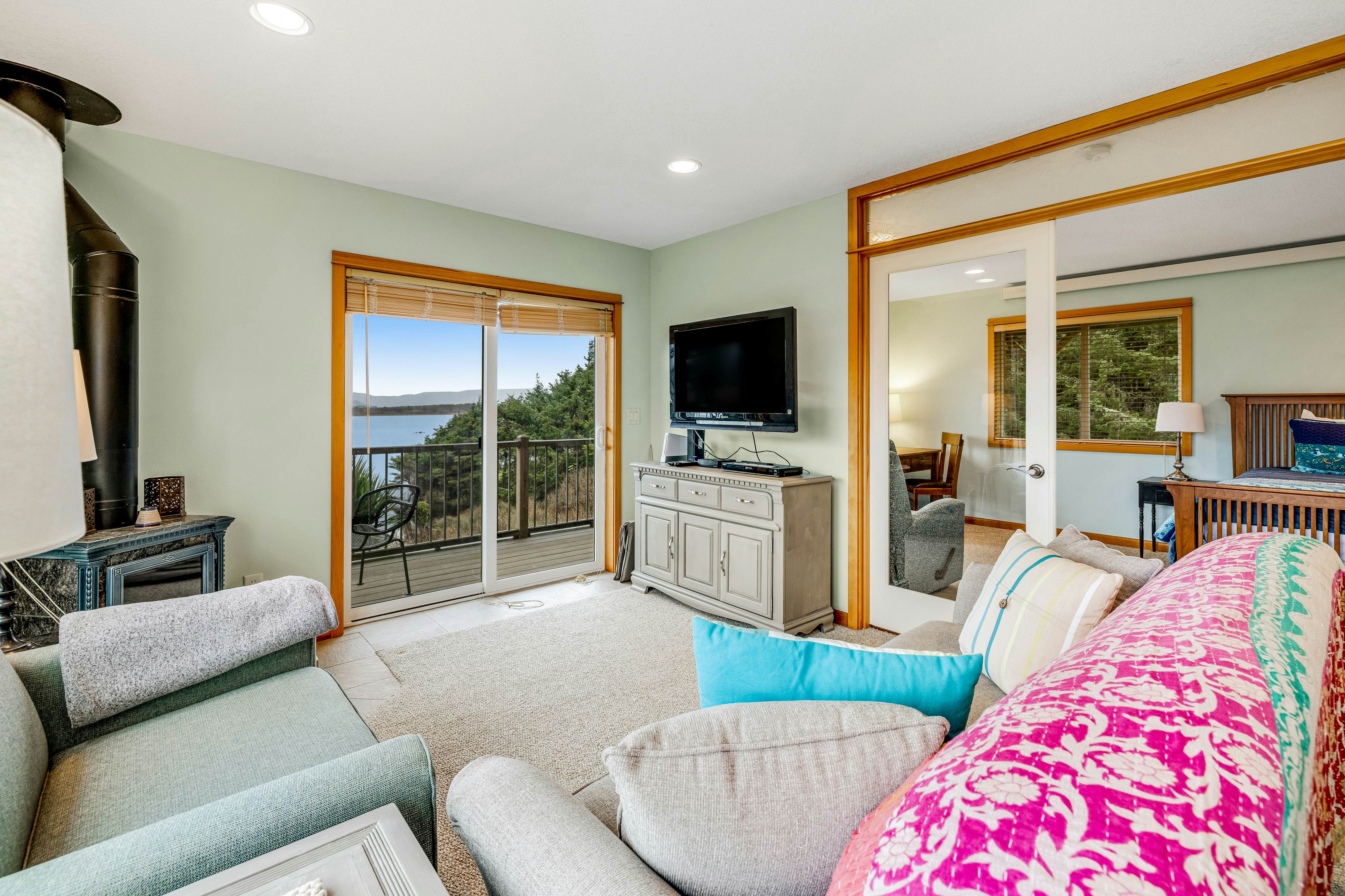 Lakefront escape with water views, grill, wrap-around deck - walk to beach