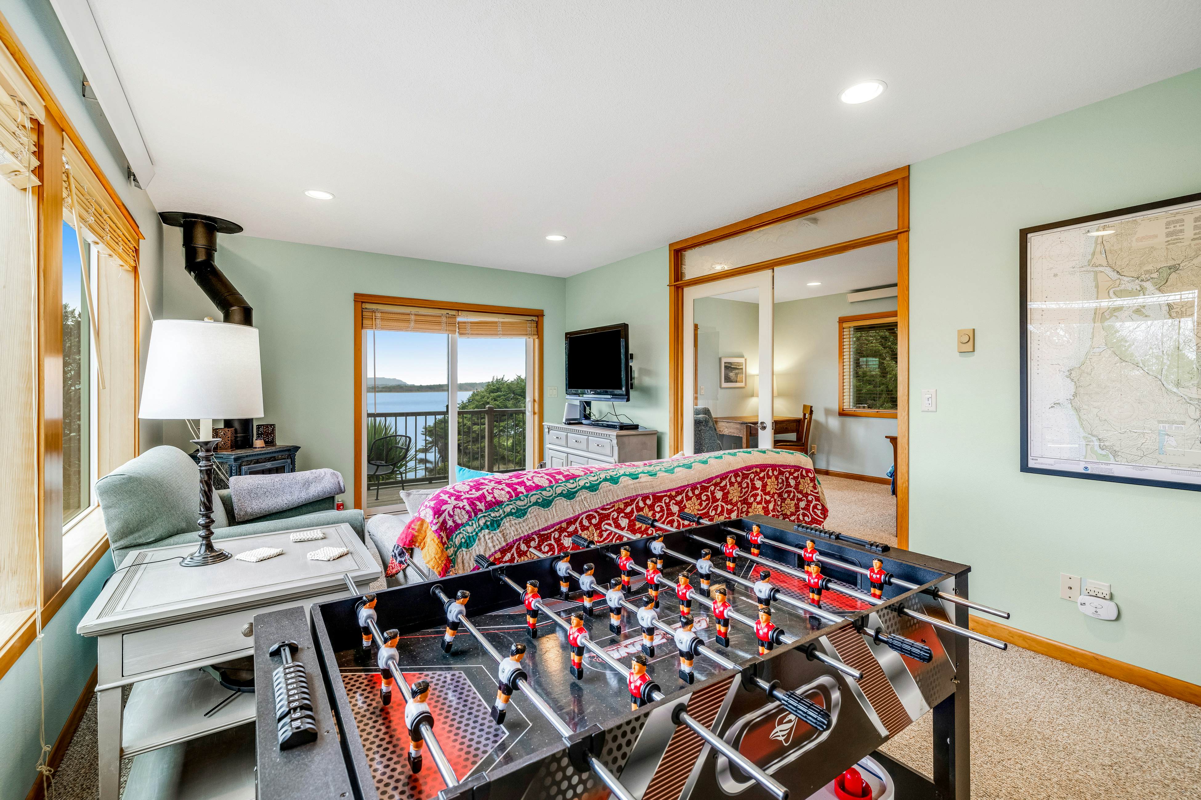 Lakefront escape with water views, grill, wrap-around deck - walk to beach