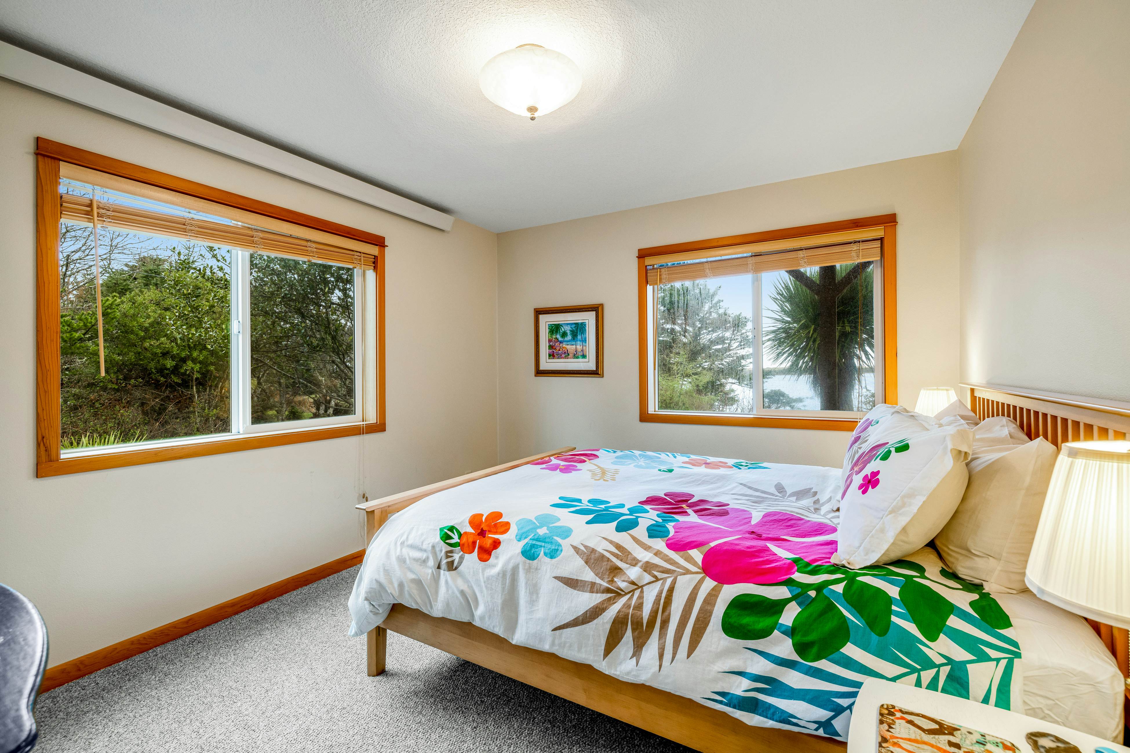 Lakefront escape with water views, grill, wrap-around deck - walk to beach