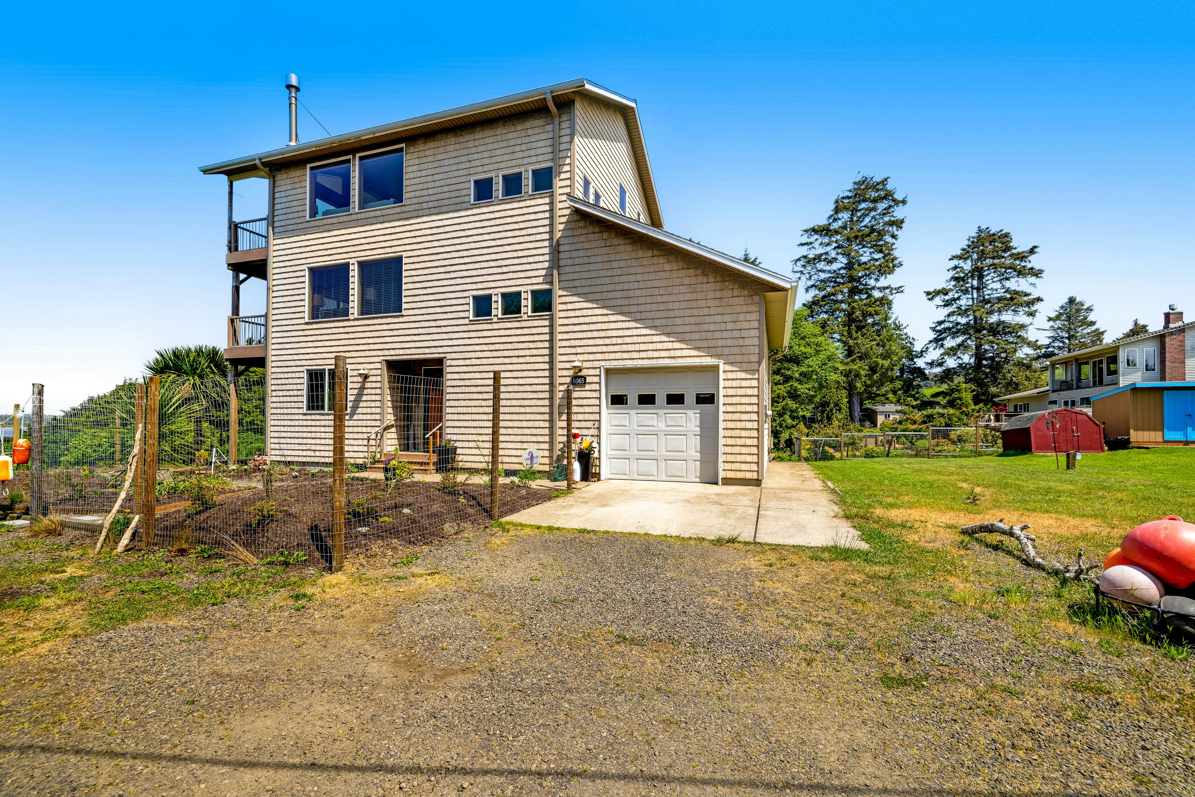 Lakefront escape with water views, grill, wrap-around deck - walk to beach