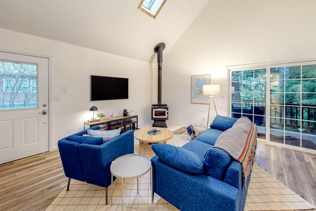 Renovated three story home by the beach with a furnished deck and washer dryer