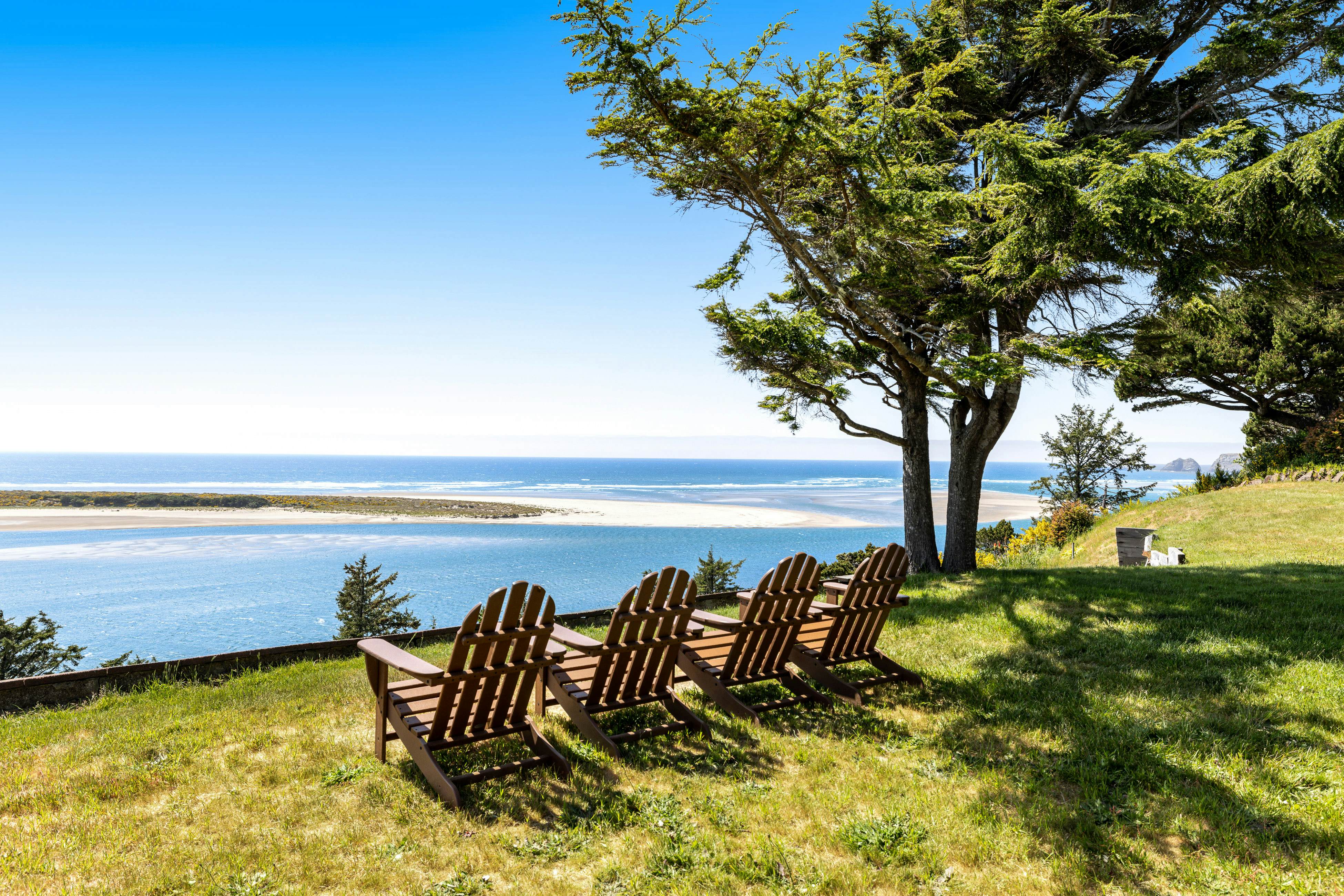 Ocean-view dog-friendly home with hot tub, large lawn, home office, & Ping-Pong