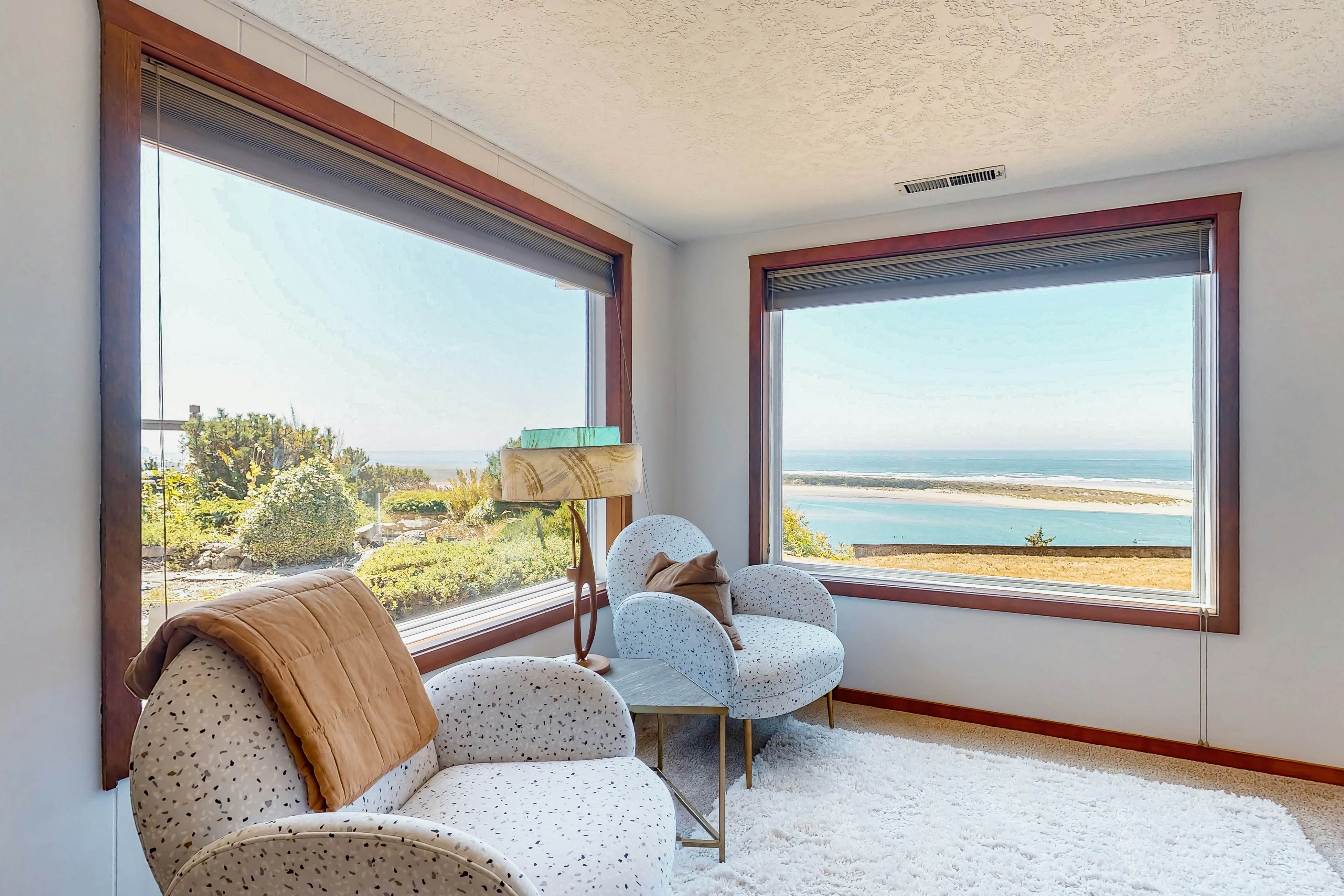Ocean-view dog-friendly home with hot tub, large lawn, home office, & Ping-Pong