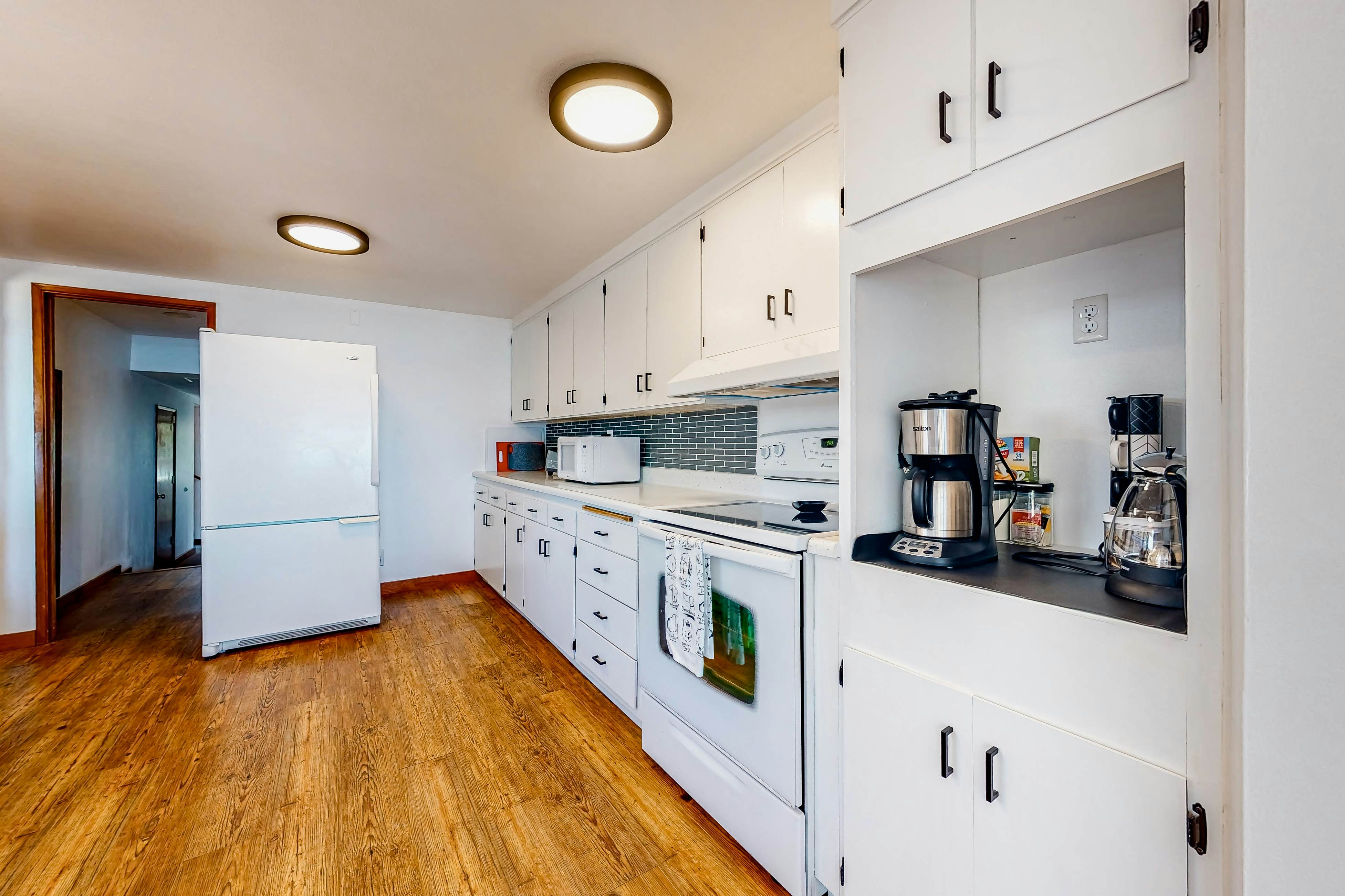 Ocean-view dog-friendly home with hot tub, large lawn, home office, & Ping-Pong