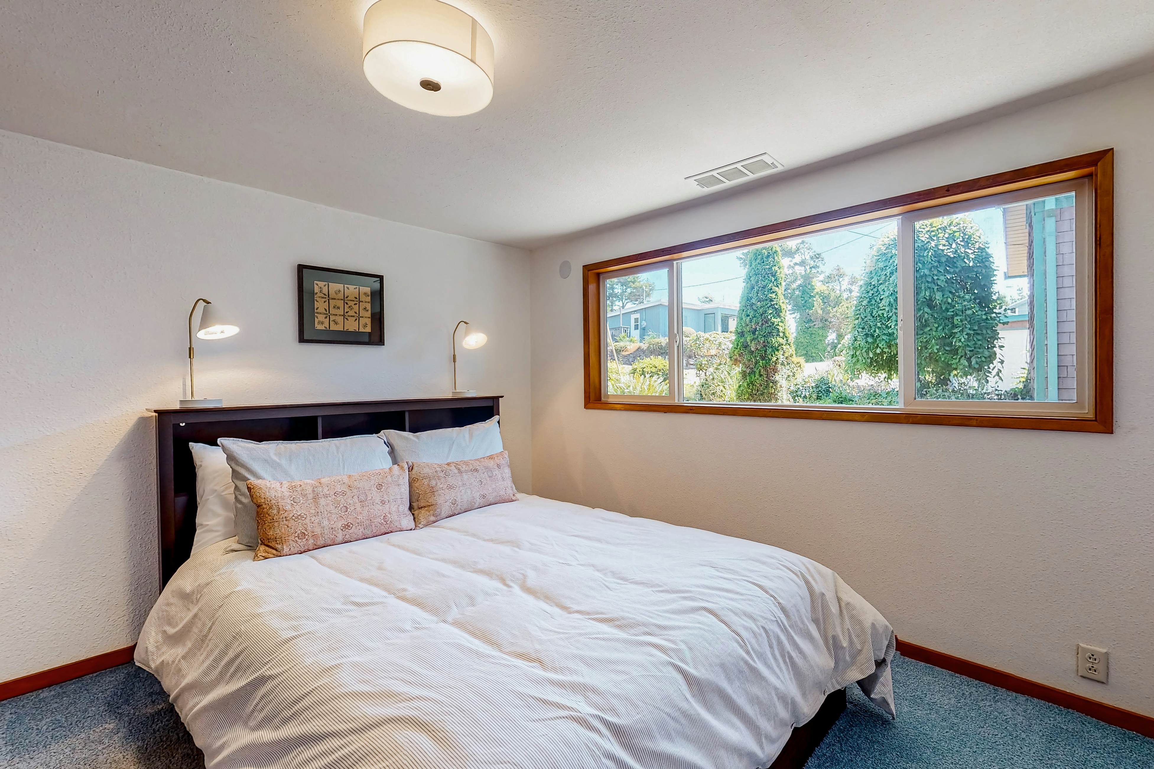 Ocean-view dog-friendly home with hot tub, large lawn, home office, & Ping-Pong