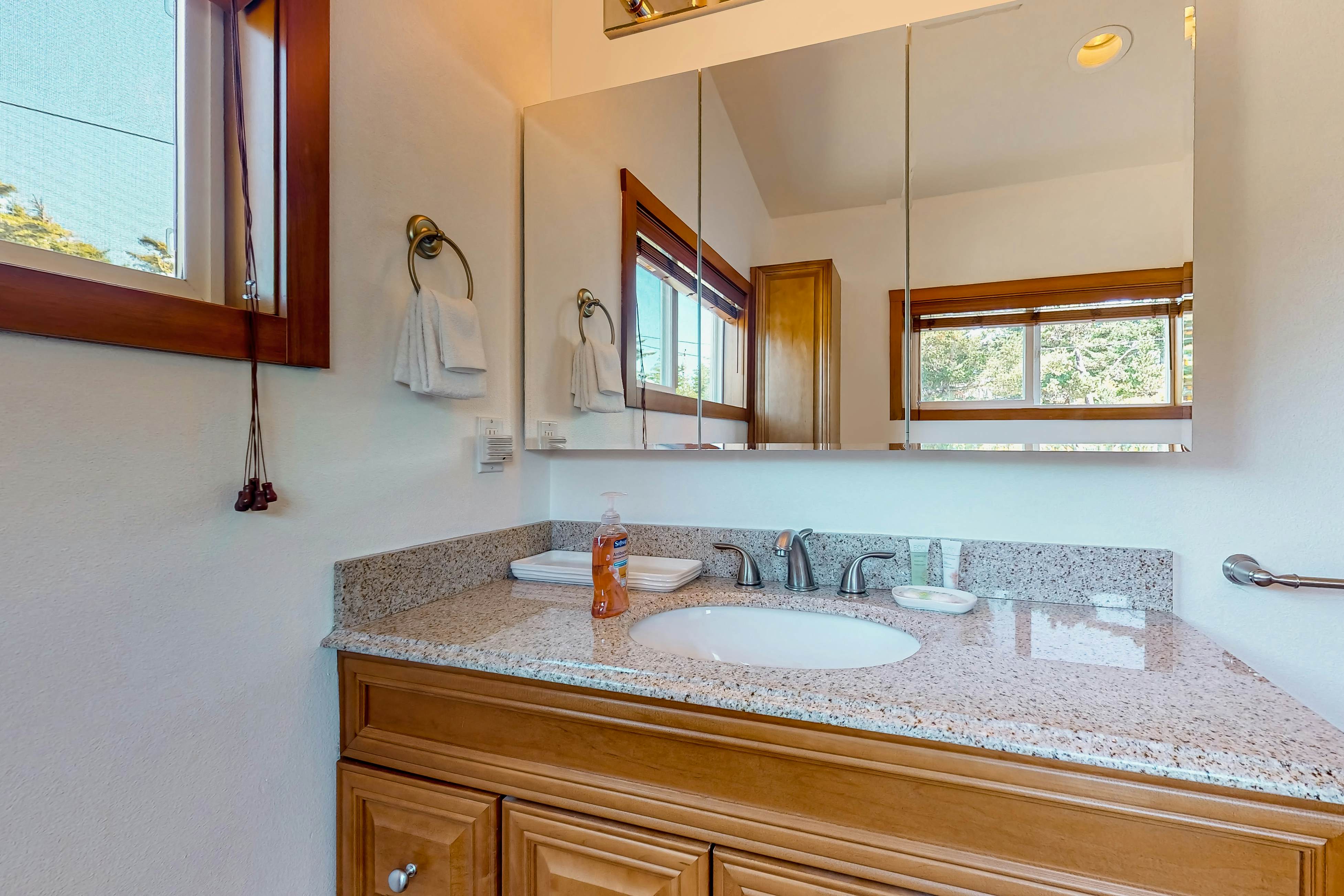 Ocean-view dog-friendly home with hot tub, large lawn, home office, & Ping-Pong