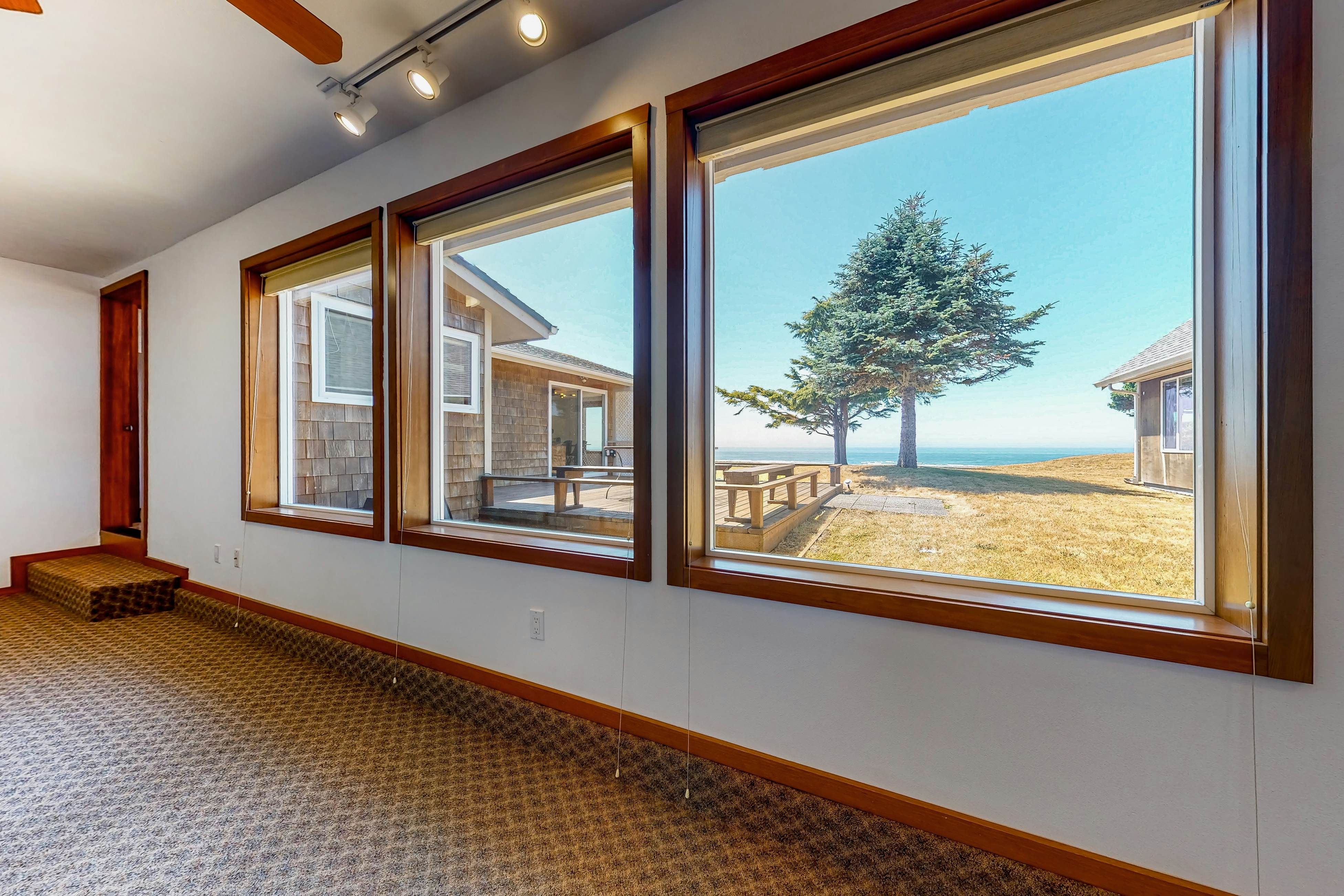 Ocean-view dog-friendly home with hot tub, large lawn, home office, & Ping-Pong