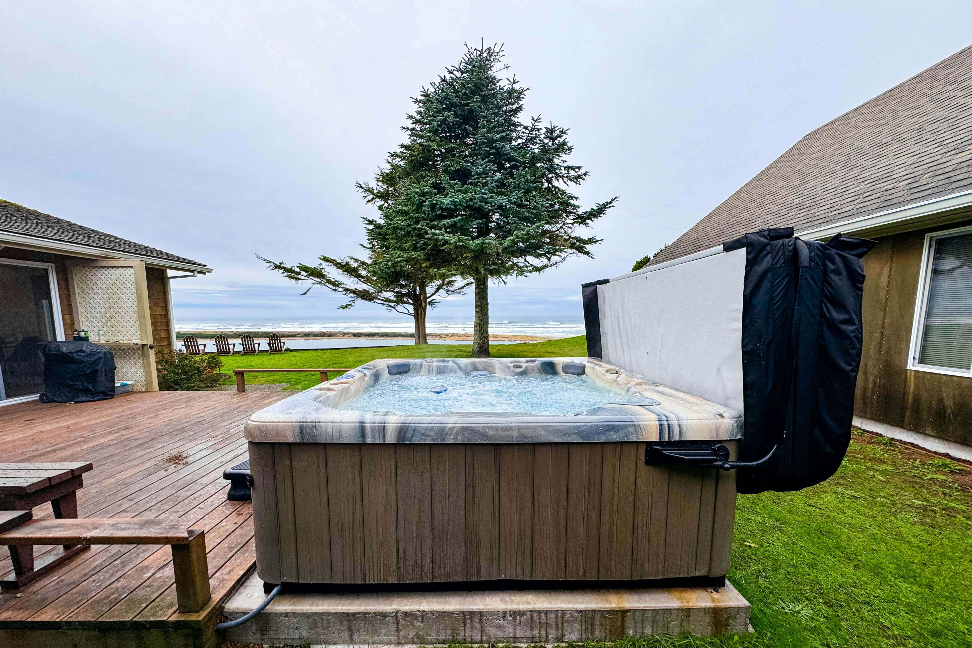 Ocean-view dog-friendly home with hot tub, large lawn, home office, & Ping-Pong