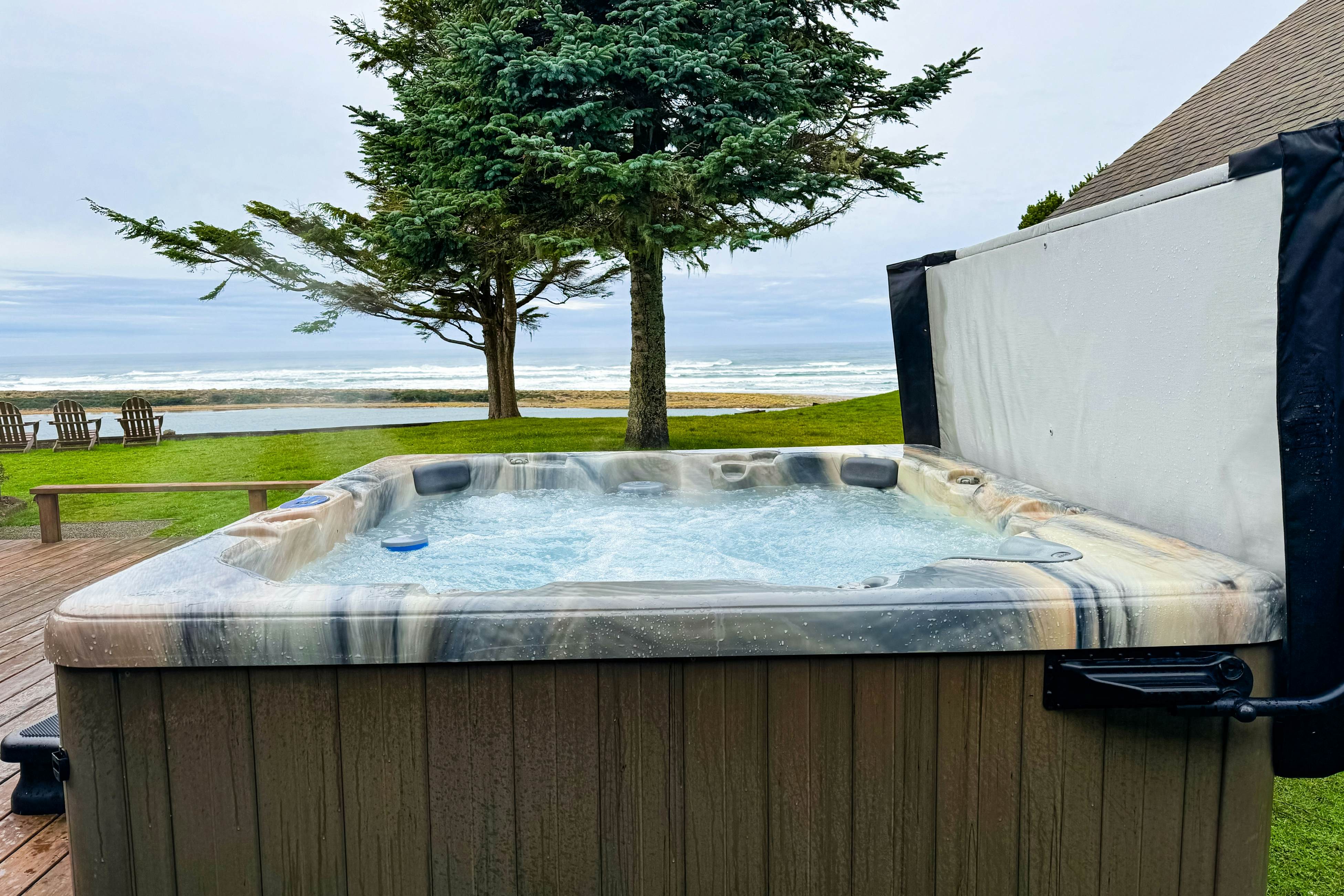 Ocean-view dog-friendly home with hot tub, large lawn, home office, & Ping-Pong