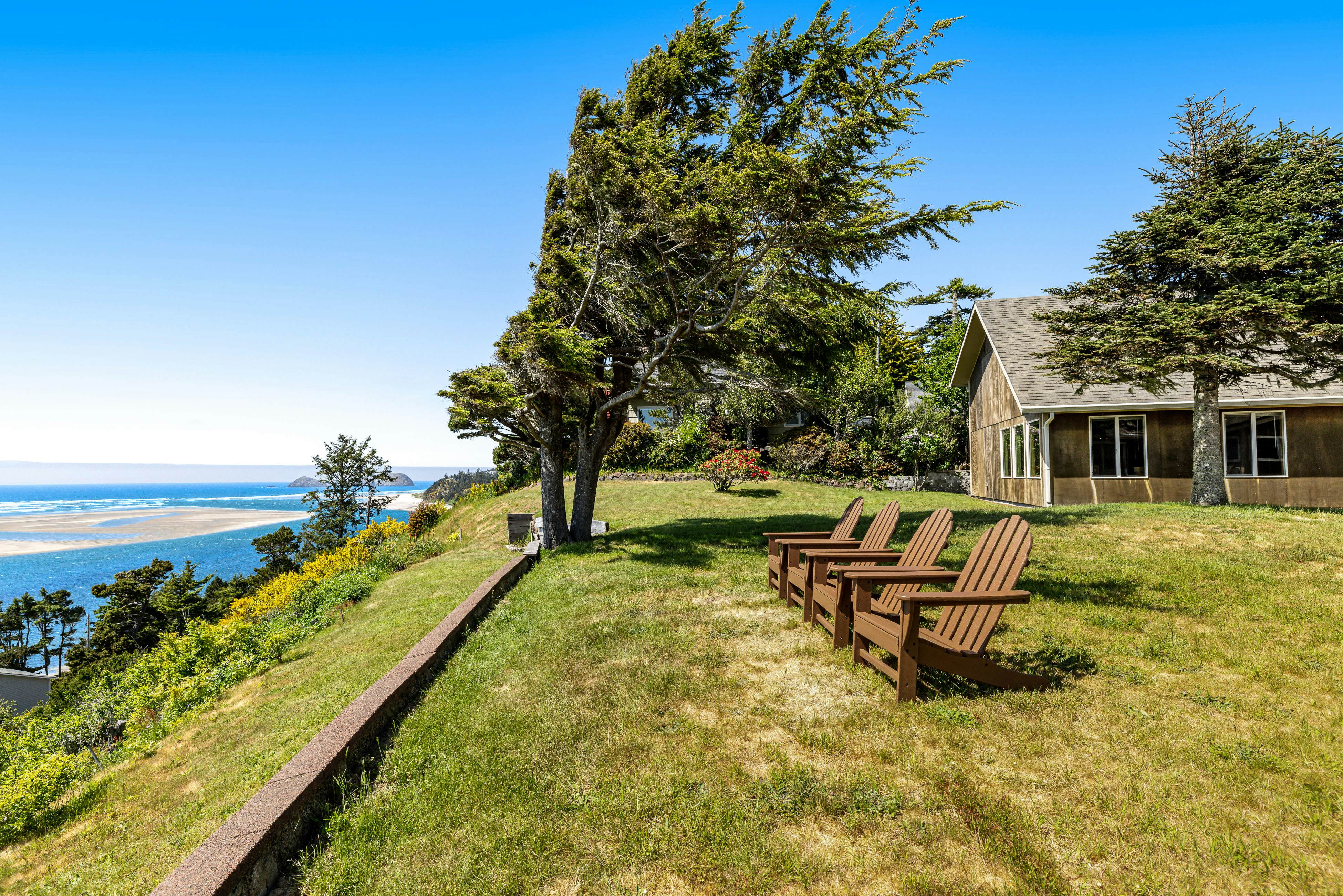 Ocean-view dog-friendly home with hot tub, large lawn, home office, & Ping-Pong