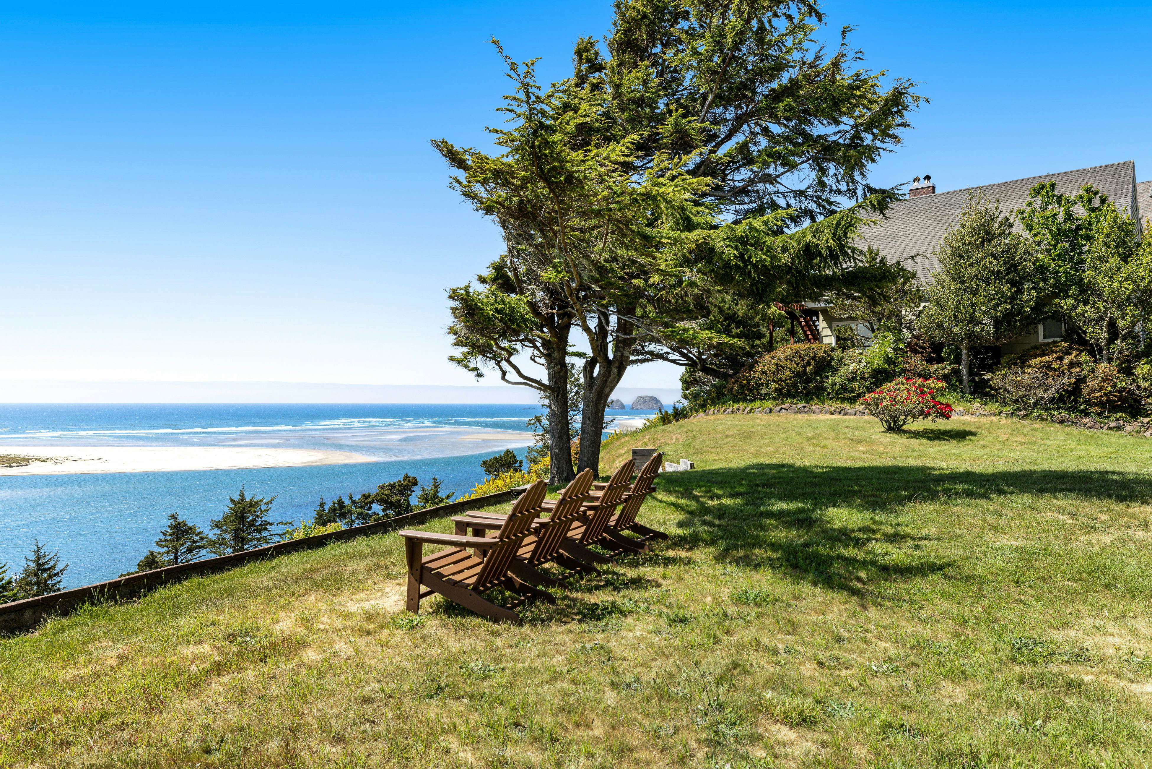 Ocean-view dog-friendly home with hot tub, large lawn, home office, & Ping-Pong