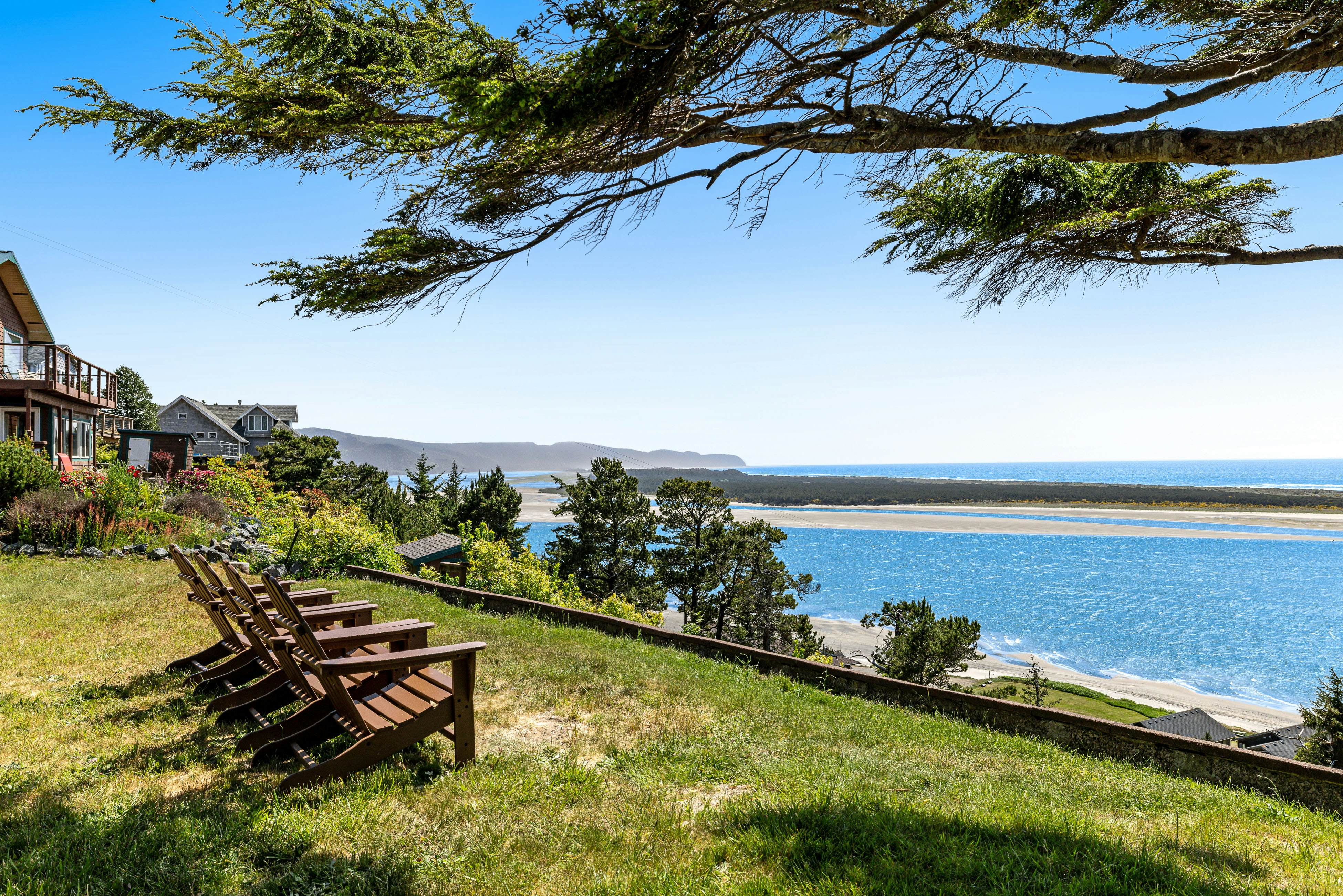 Ocean-view dog-friendly home with hot tub, large lawn, home office, & Ping-Pong