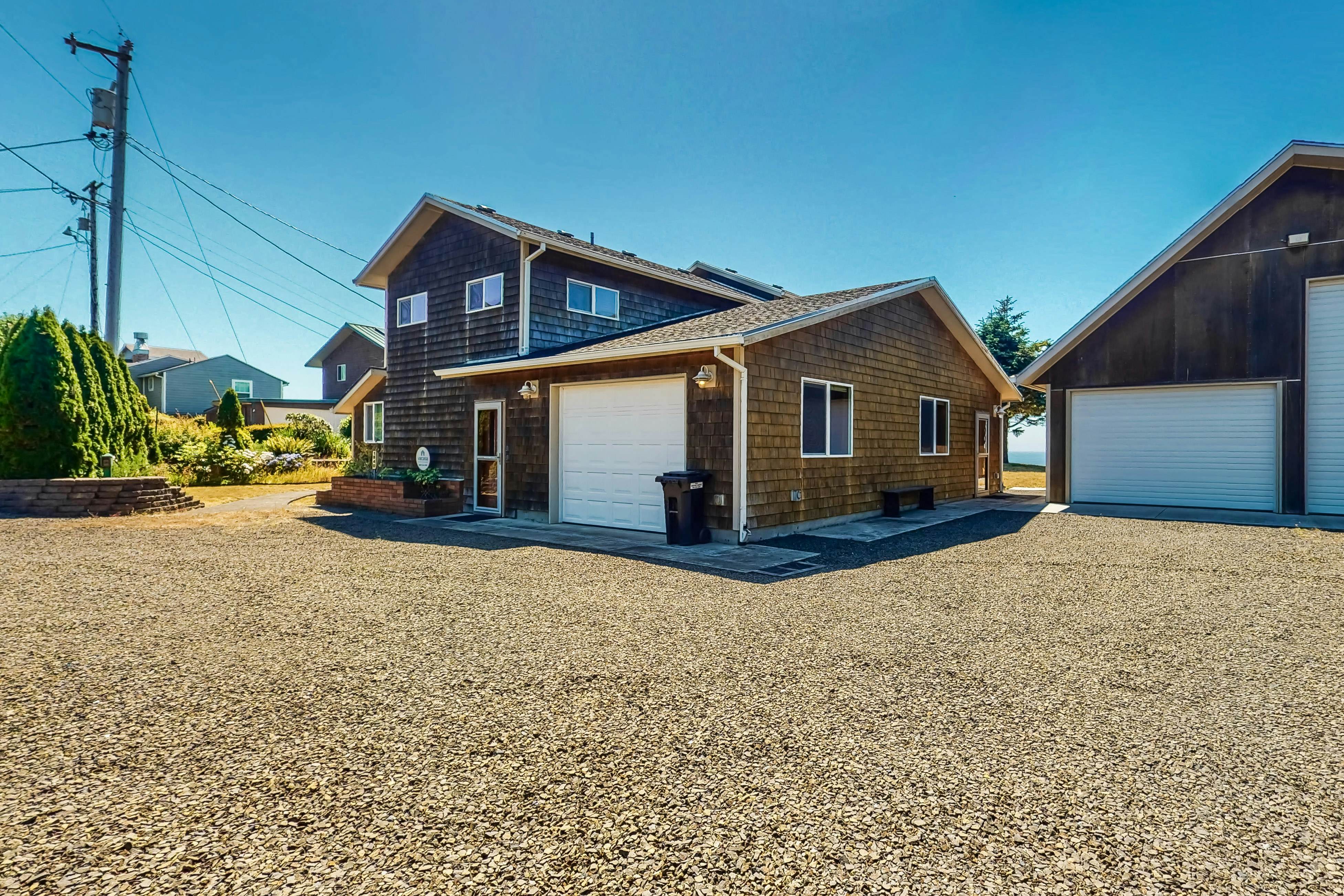 Ocean-view dog-friendly home with hot tub, large lawn, home office, & Ping-Pong