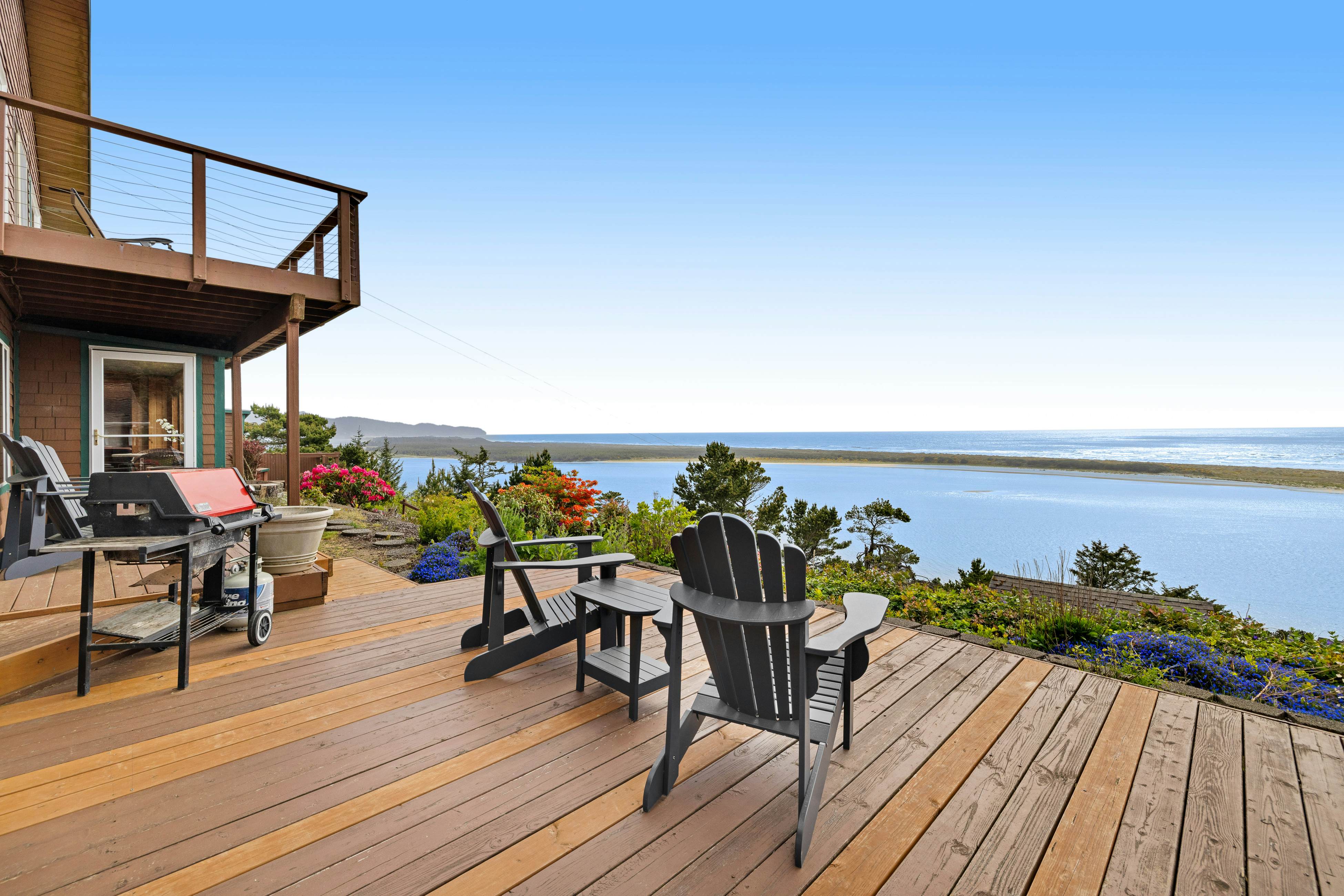 Dog-friendly home with balcony, porches & top-of-the world ocean views