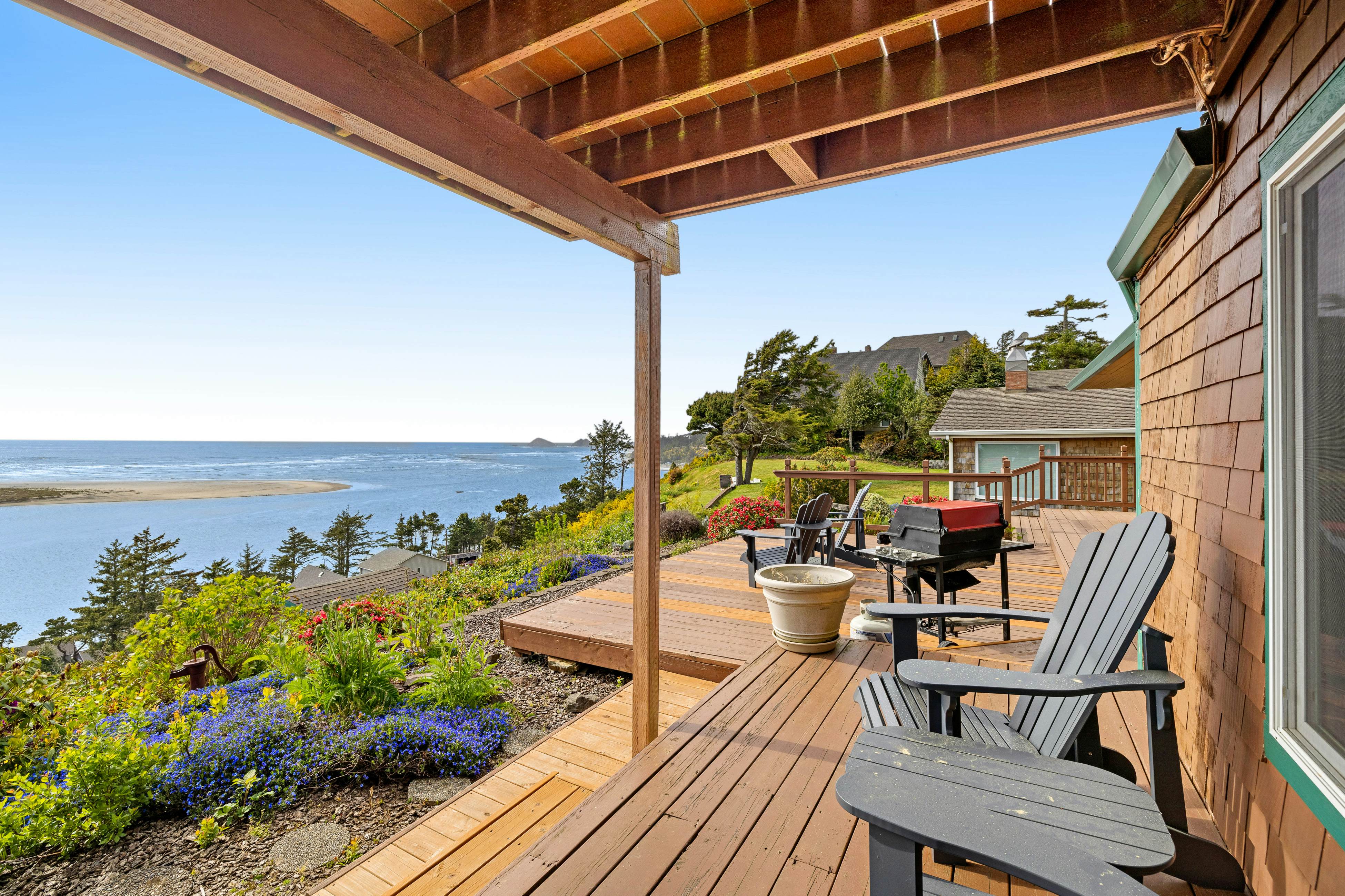 Dog-friendly home with balcony, porches & top-of-the world ocean views