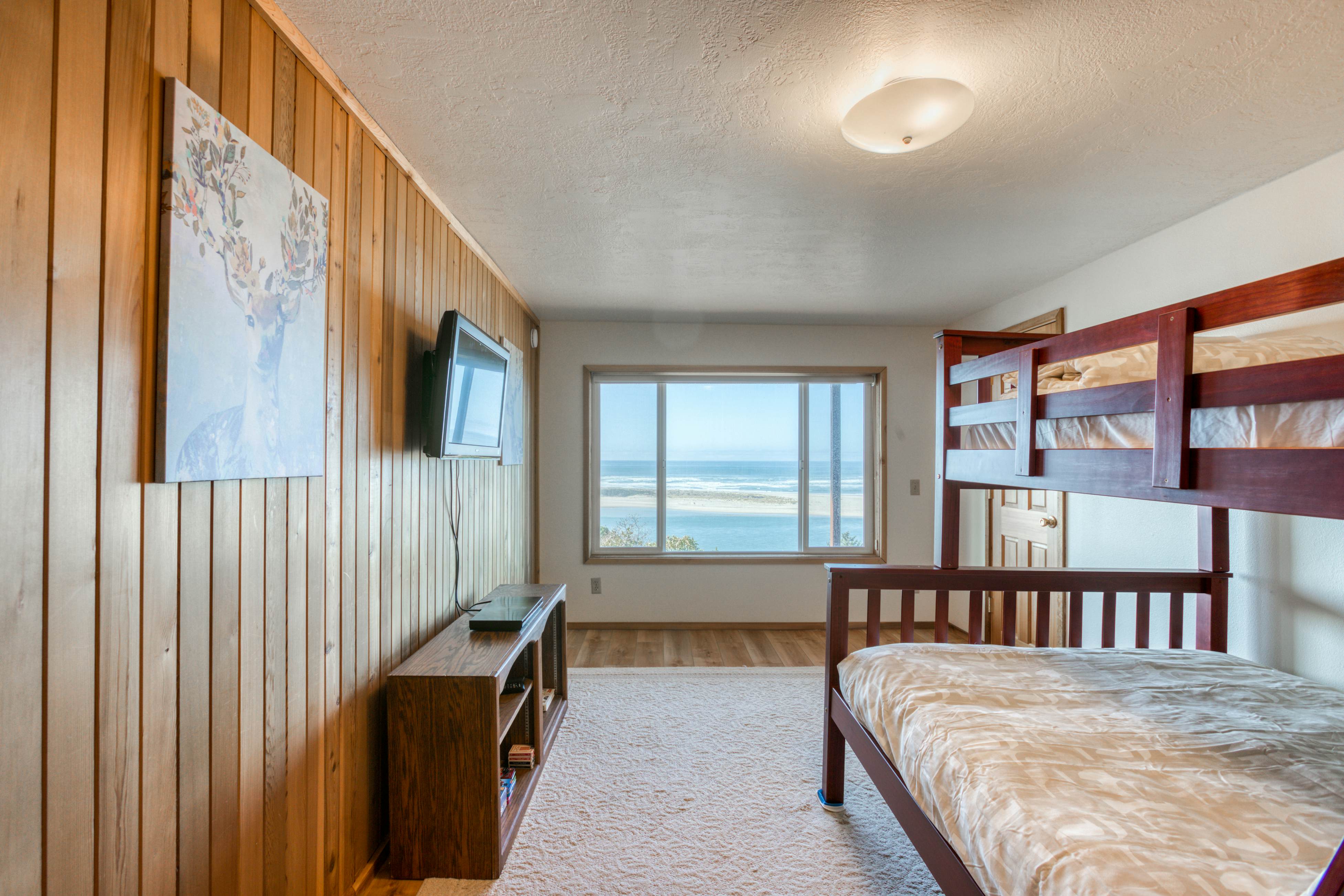 Dog-friendly home with balcony, porches & top-of-the world ocean views