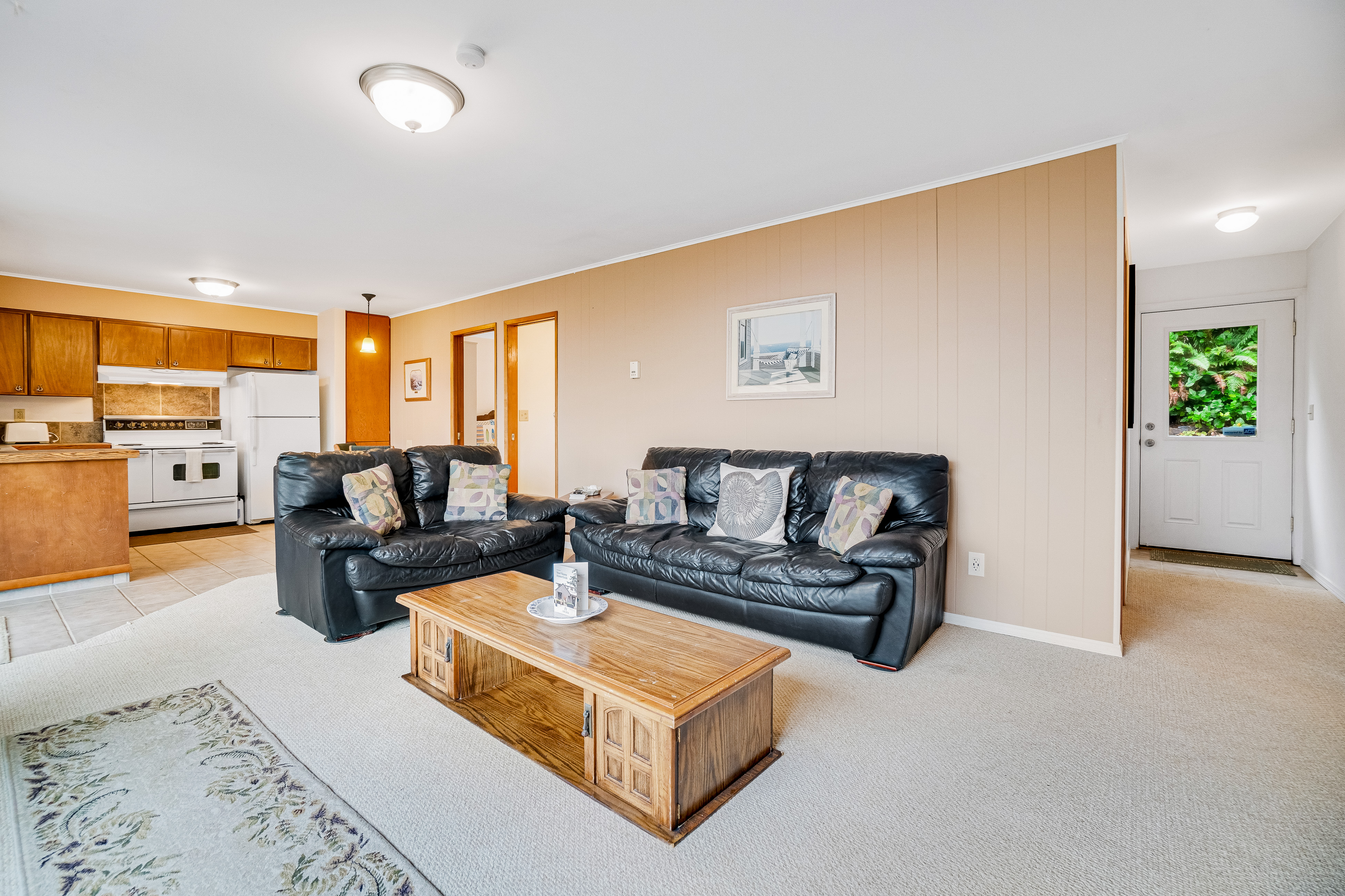 Cozy dog friendly home with ocean views a private hot tub and washer and dryer