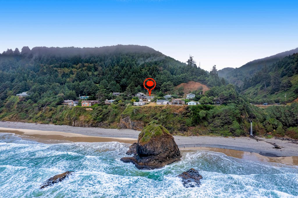 Cozy dog friendly home with ocean views a private hot tub and washer and dryer
