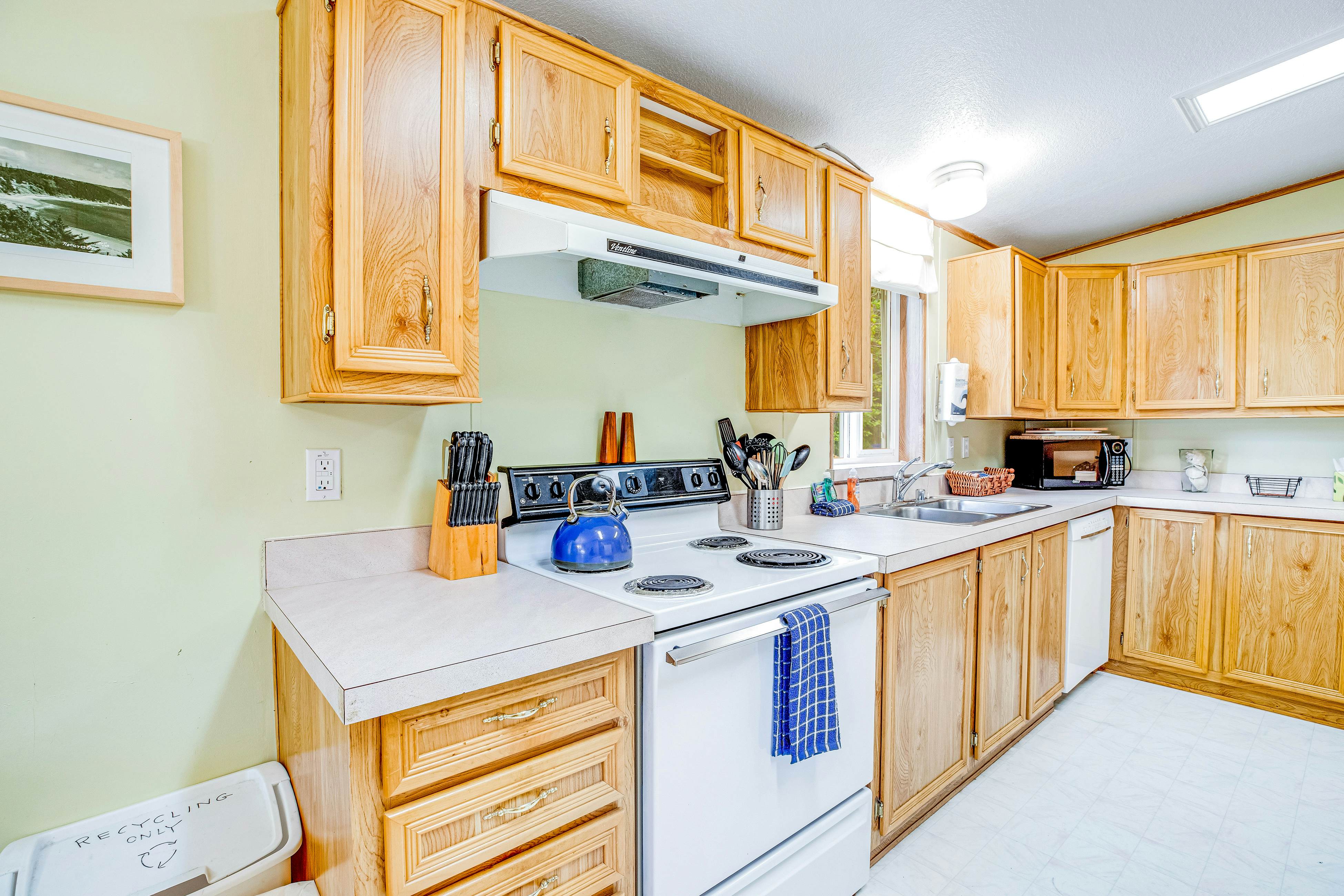 Dog-friendly home with deck, grill, firepit, washer/dryer & WiFi - walk to beach