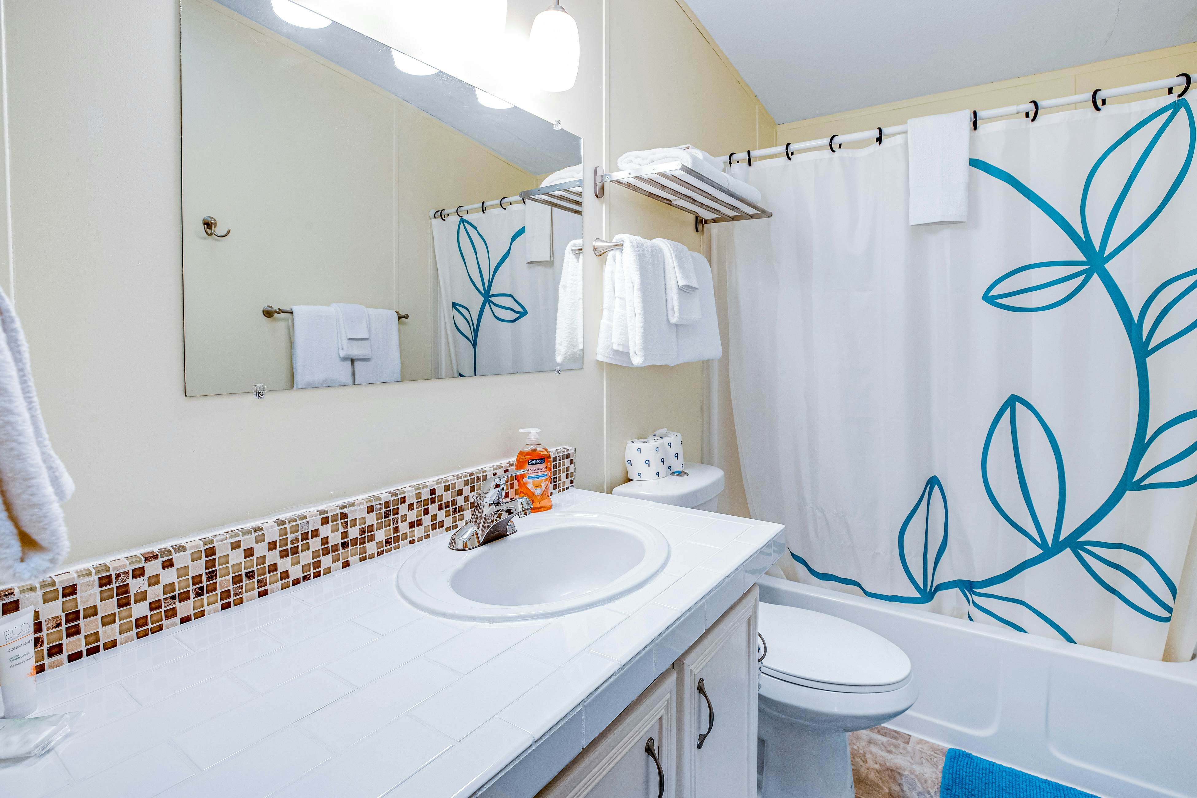 Dog-friendly home with deck, grill, firepit, washer/dryer & WiFi - walk to beach