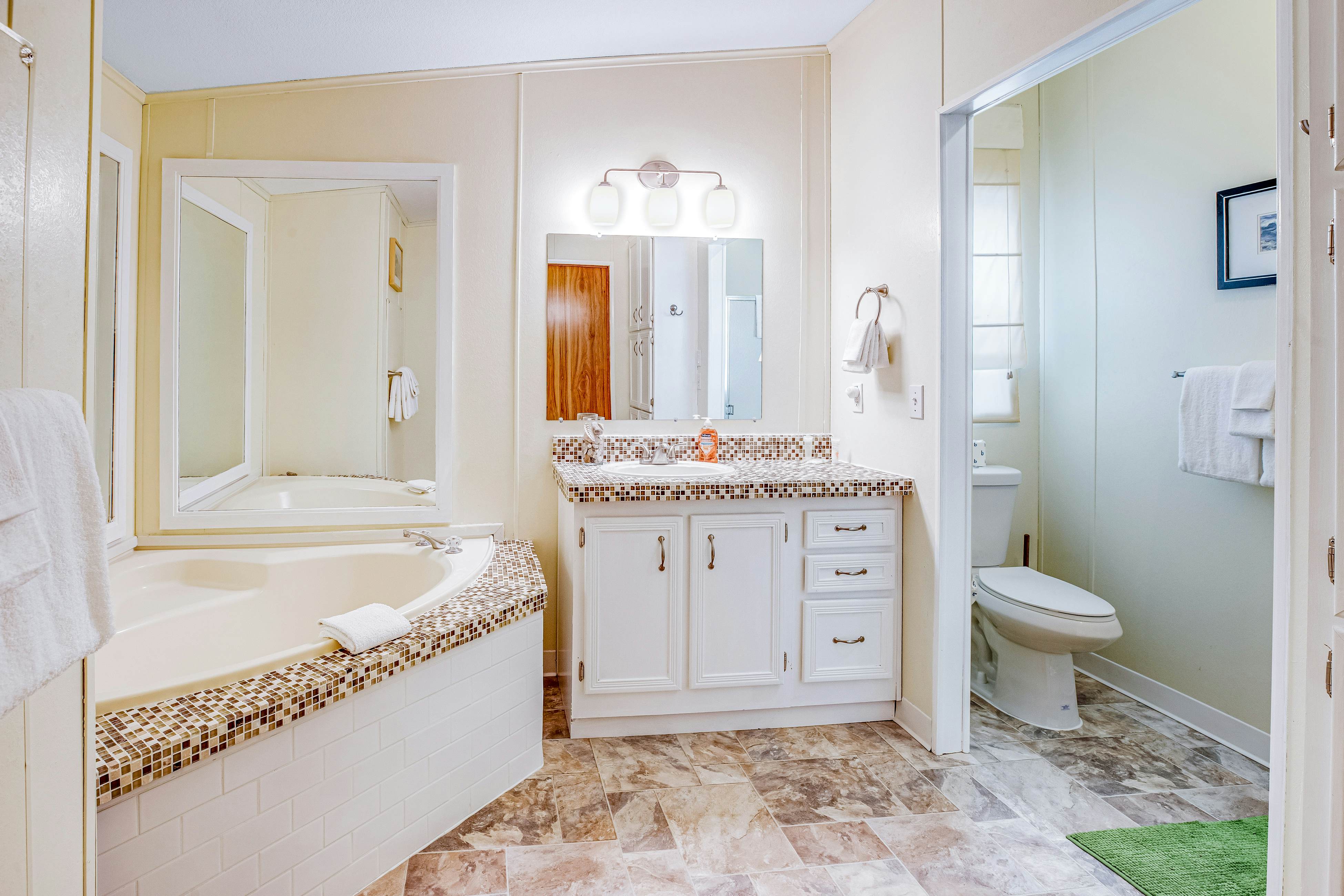 Dog-friendly home with deck, grill, firepit, washer/dryer & WiFi - walk to beach