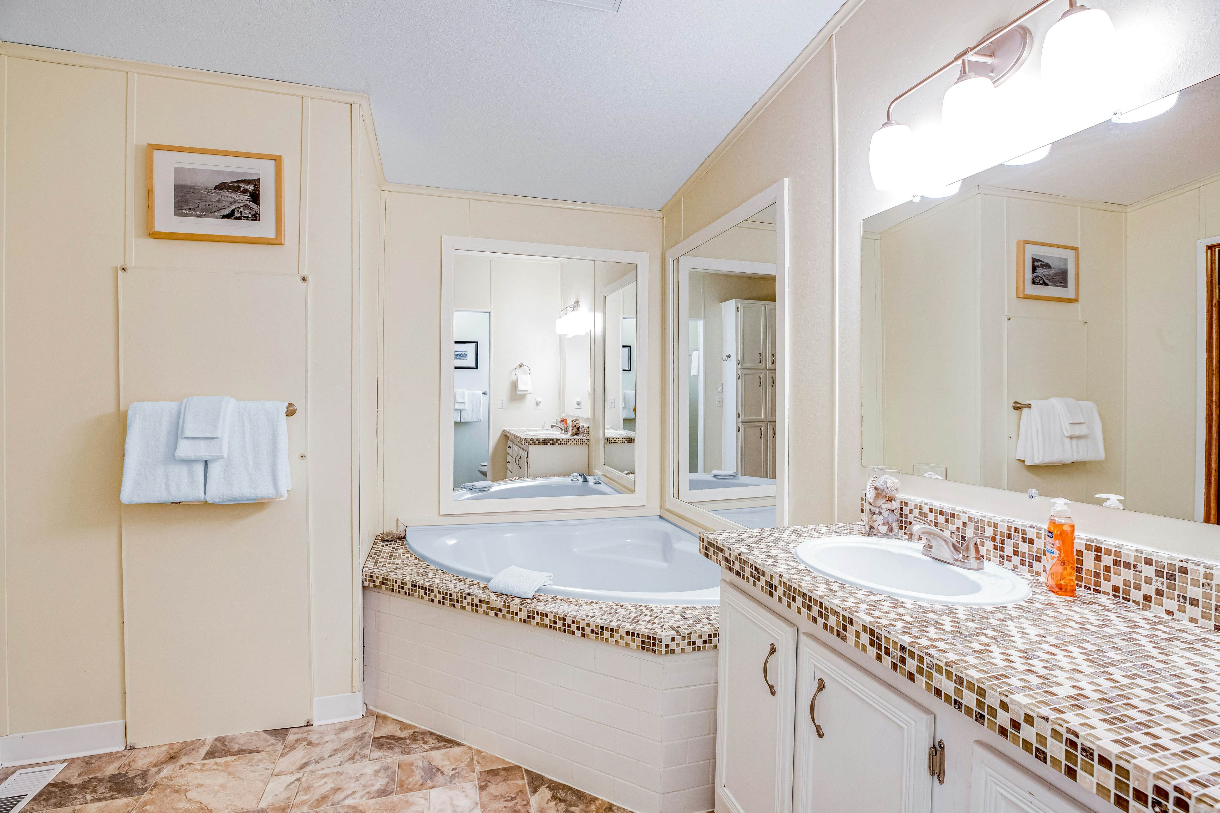 Dog-friendly home with deck, grill, firepit, washer/dryer & WiFi - walk to beach