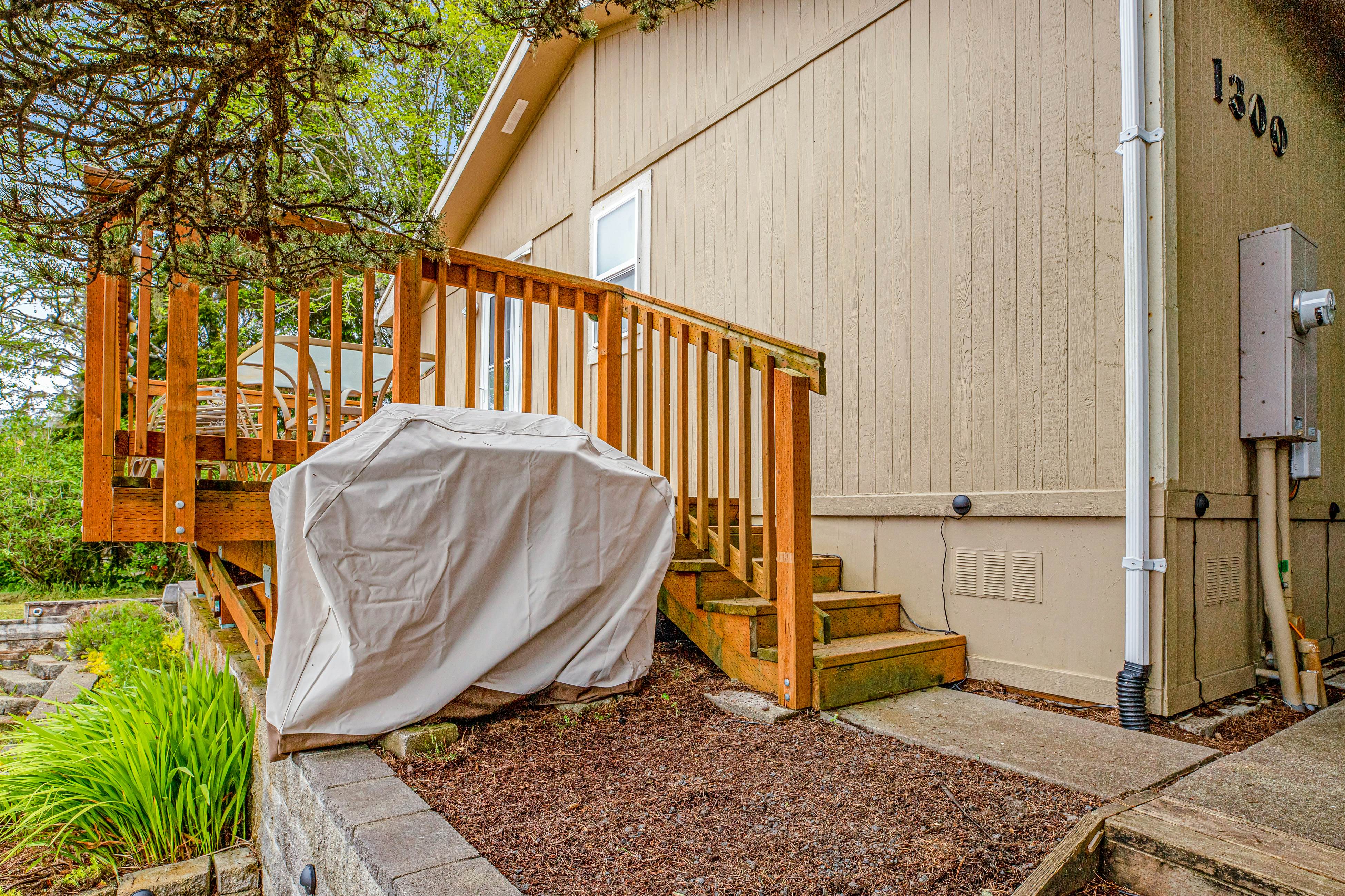 Dog-friendly home with deck, grill, firepit, washer/dryer & WiFi - walk to beach