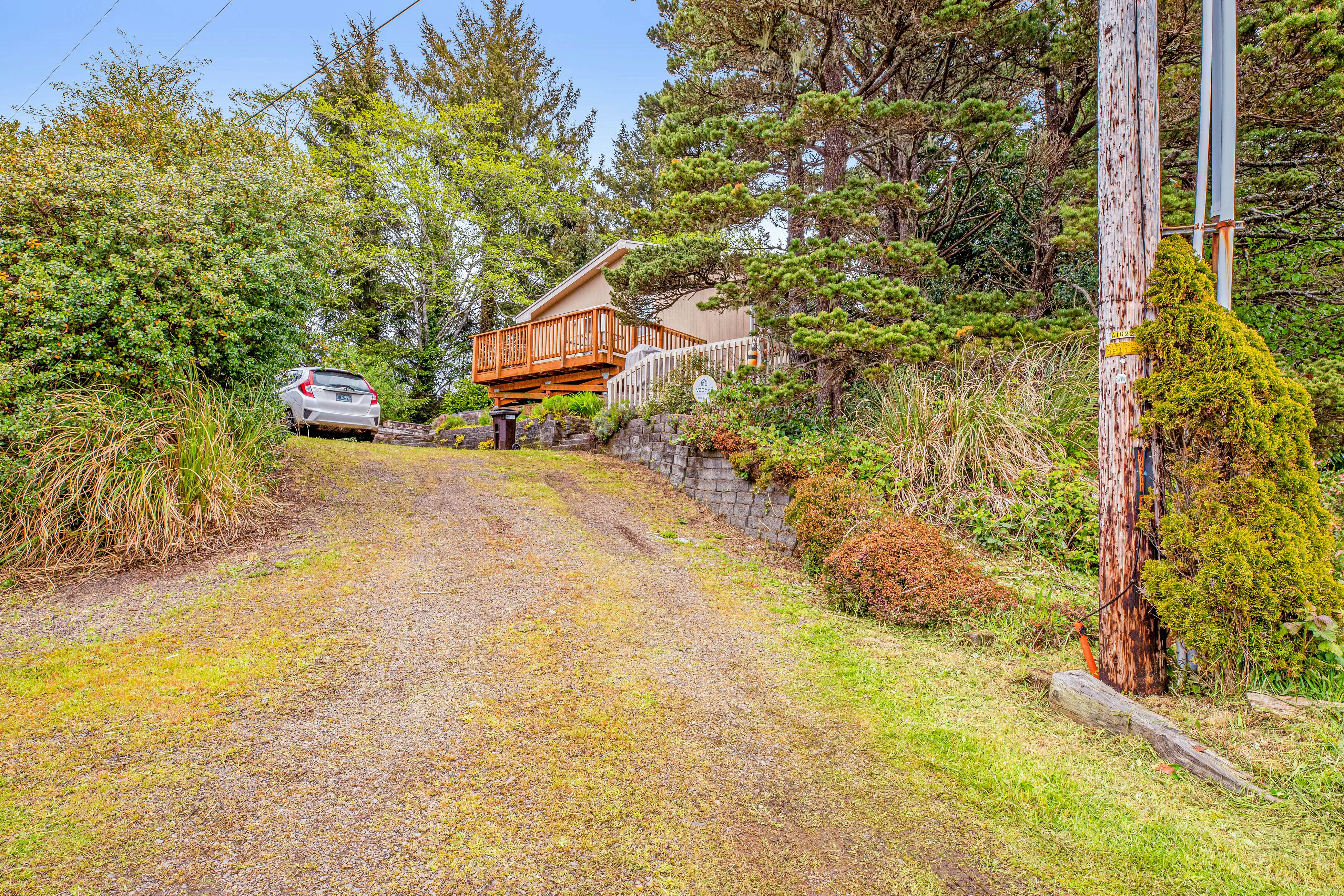 Dog-friendly home with deck, grill, firepit, washer/dryer & WiFi - walk to beach