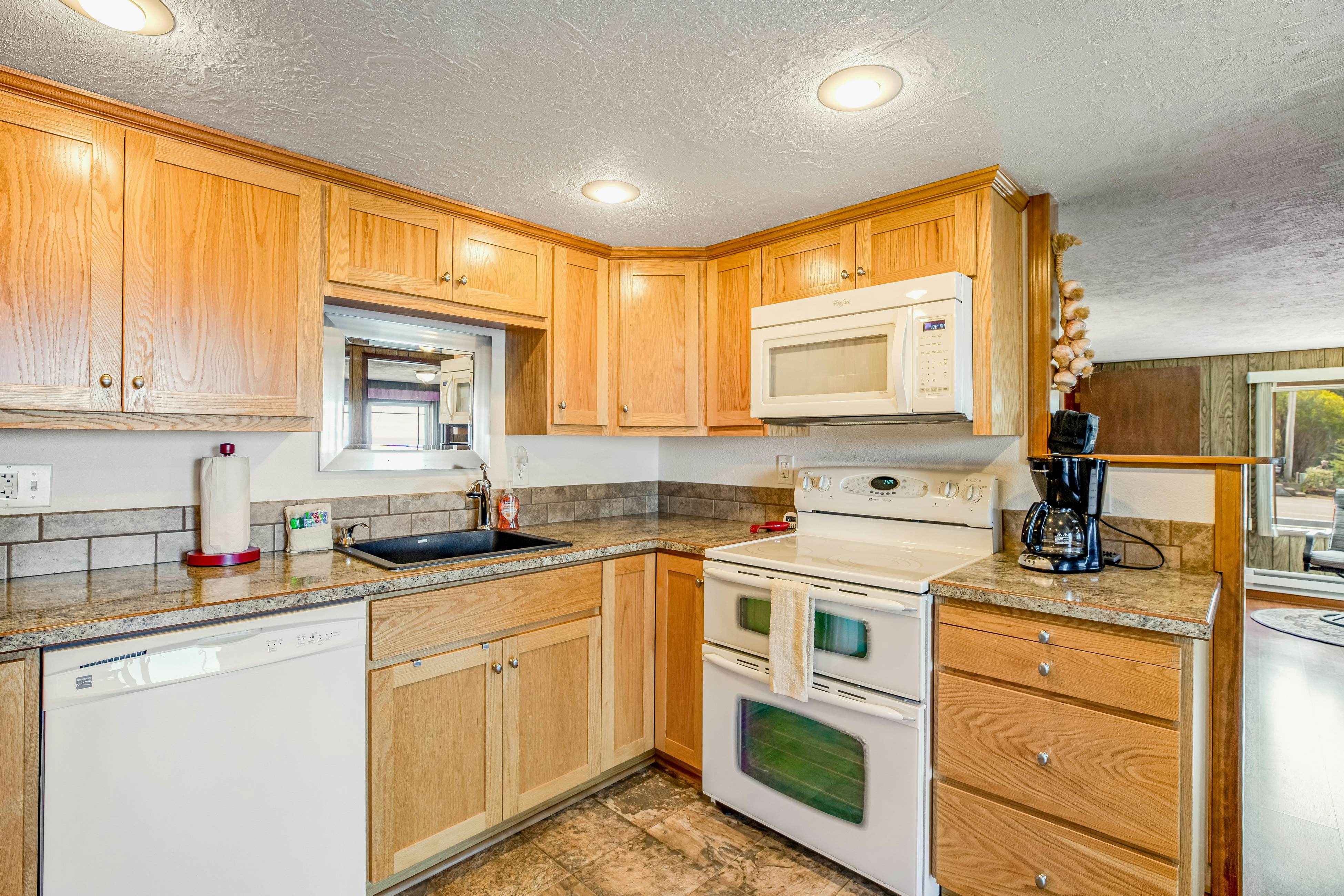 Dog-friendly home with water views, washer/dryer & fireplace - close to beaches