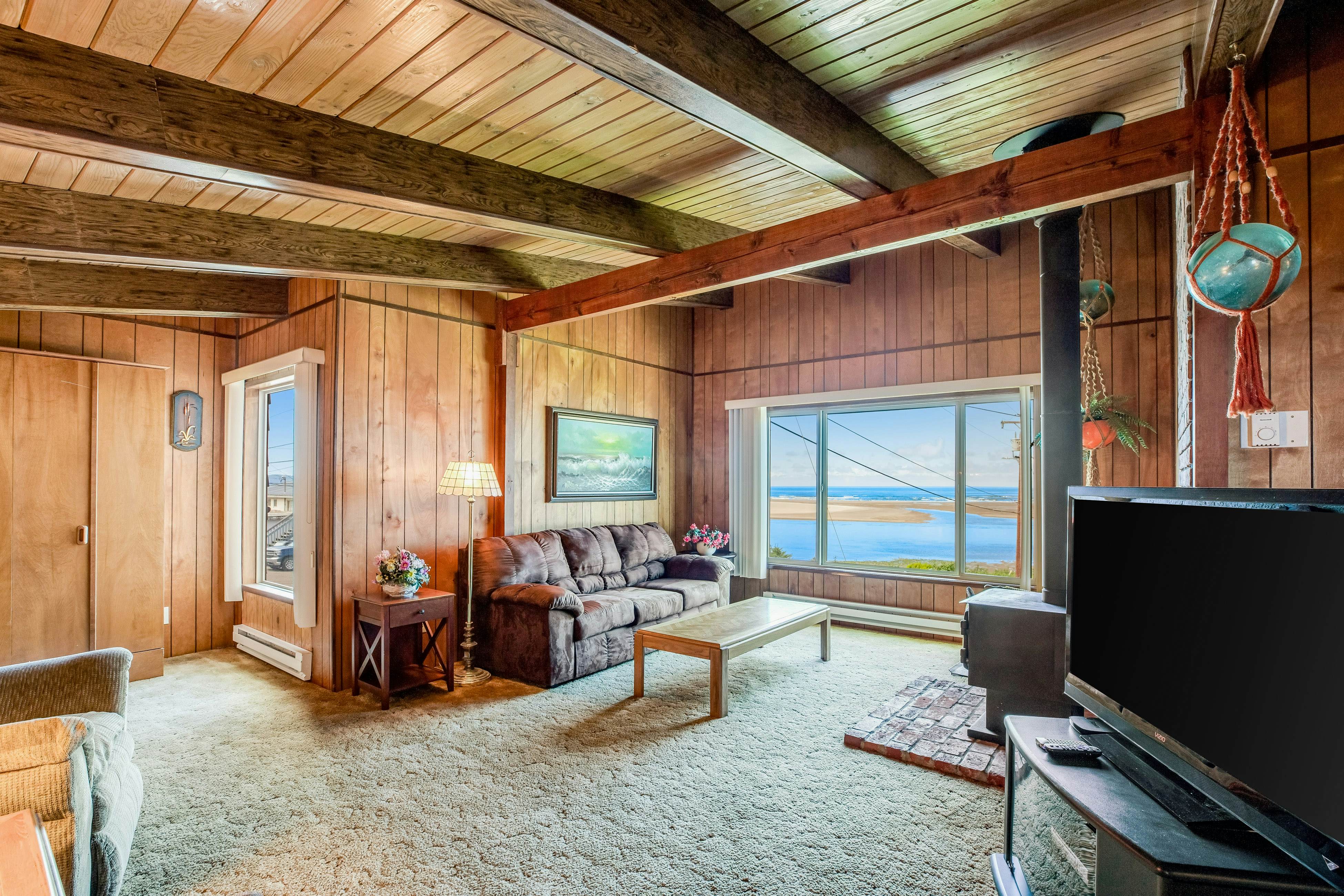 Dog-friendly home with water views, washer/dryer & fireplace - close to beaches