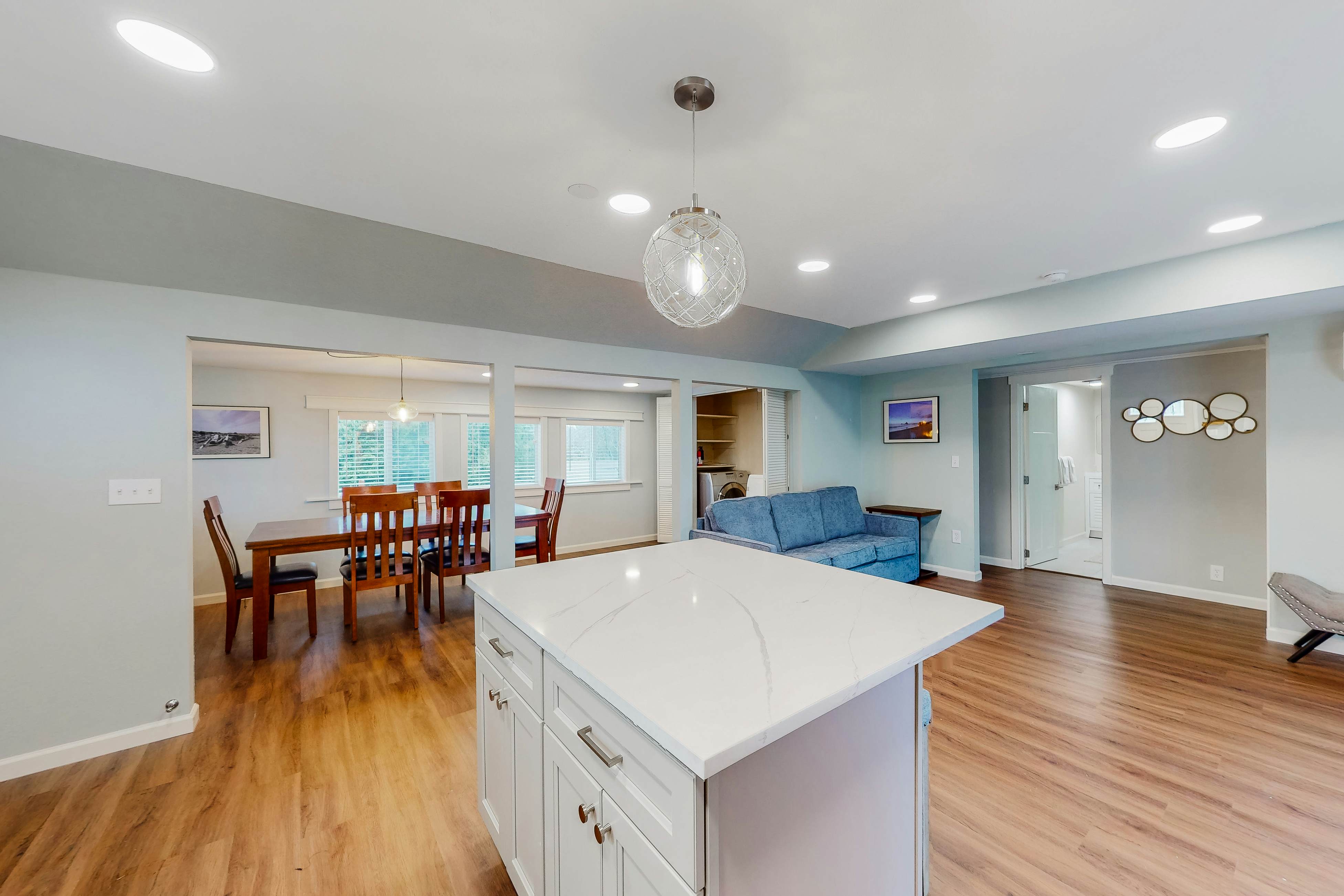 Renovated, dog-friendly cottage with a covered porch, deck, yard, & washer/dryer