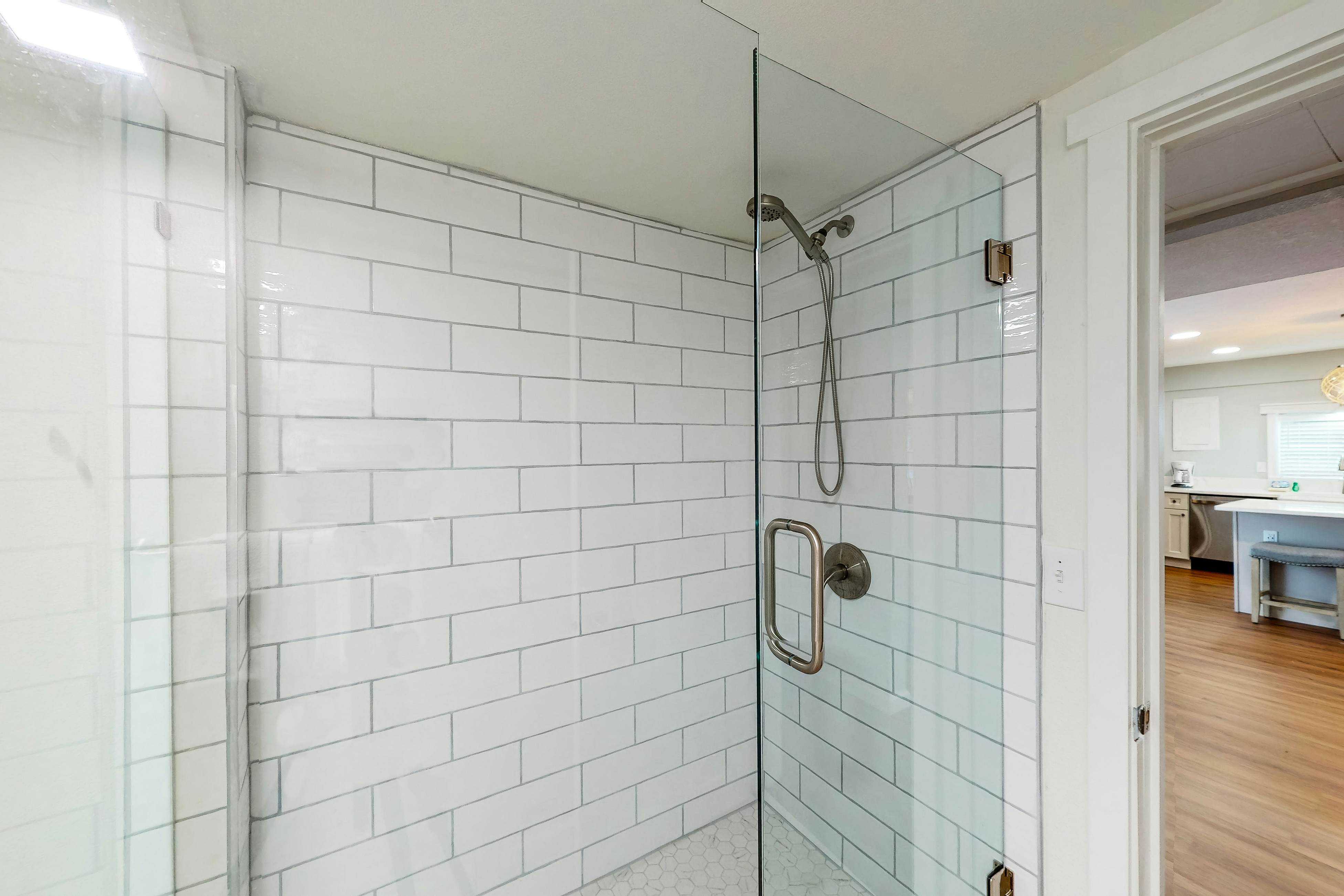 Renovated, dog-friendly cottage with a covered porch, deck, yard, & washer/dryer