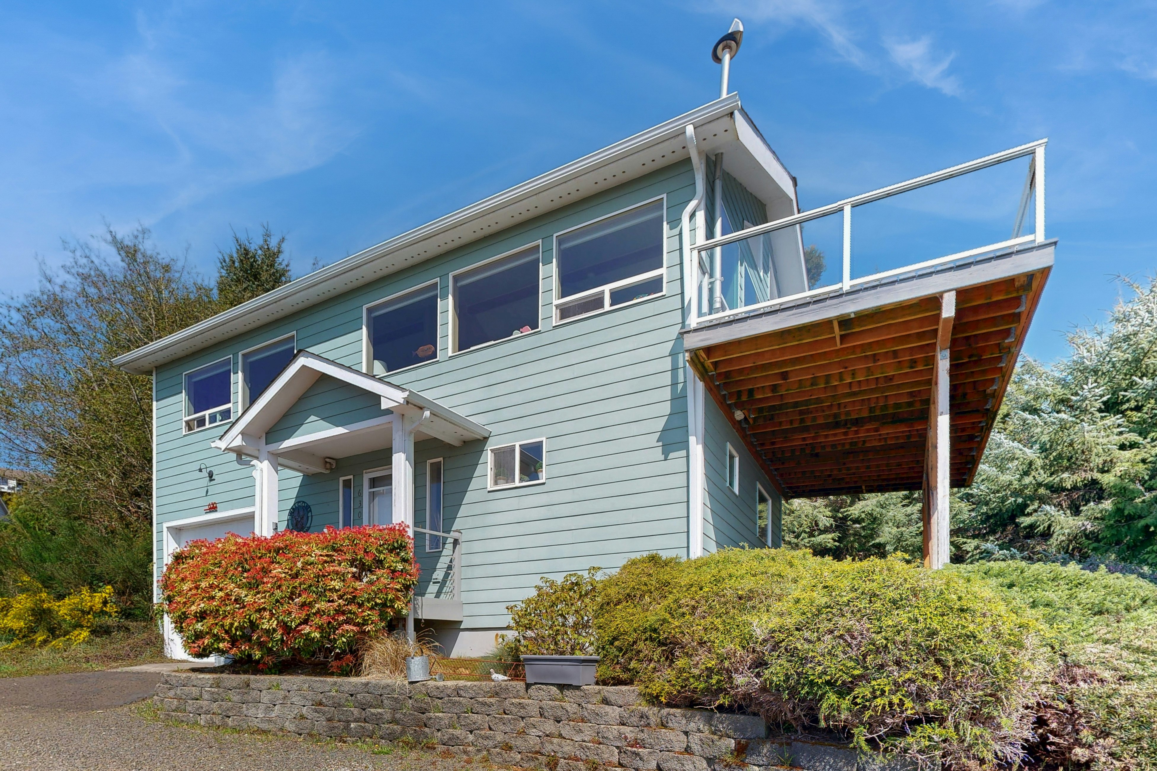 Family-friendly ocean view home w/ spacious deck, walk to beach, books, & games