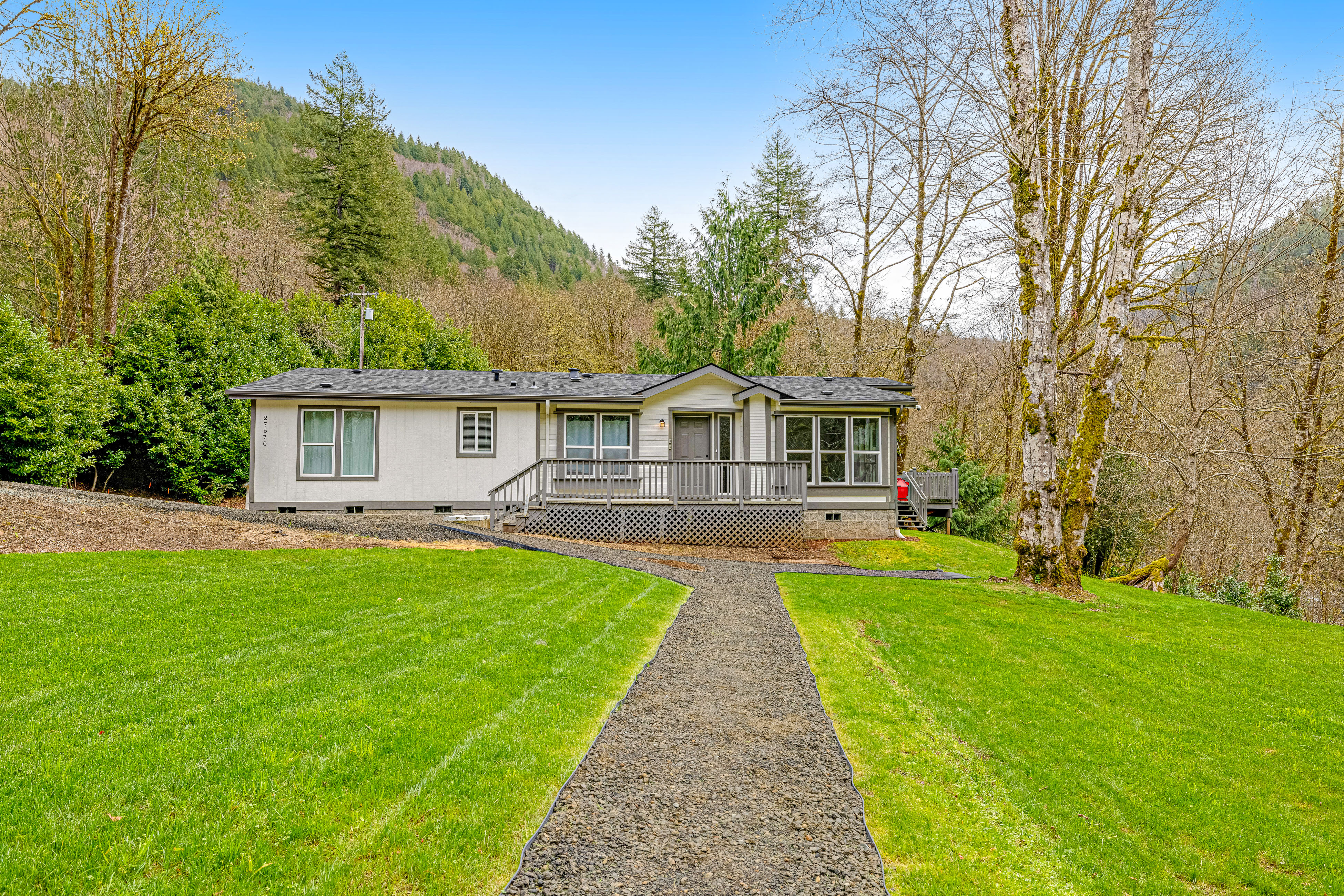 Dog friendly waterfront home on the Wilson River with great views deck and WiFi