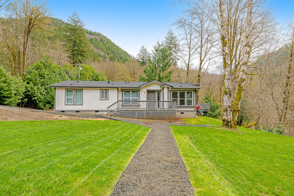 Dog friendly waterfront home on the Wilson River with great views deck and WiFi