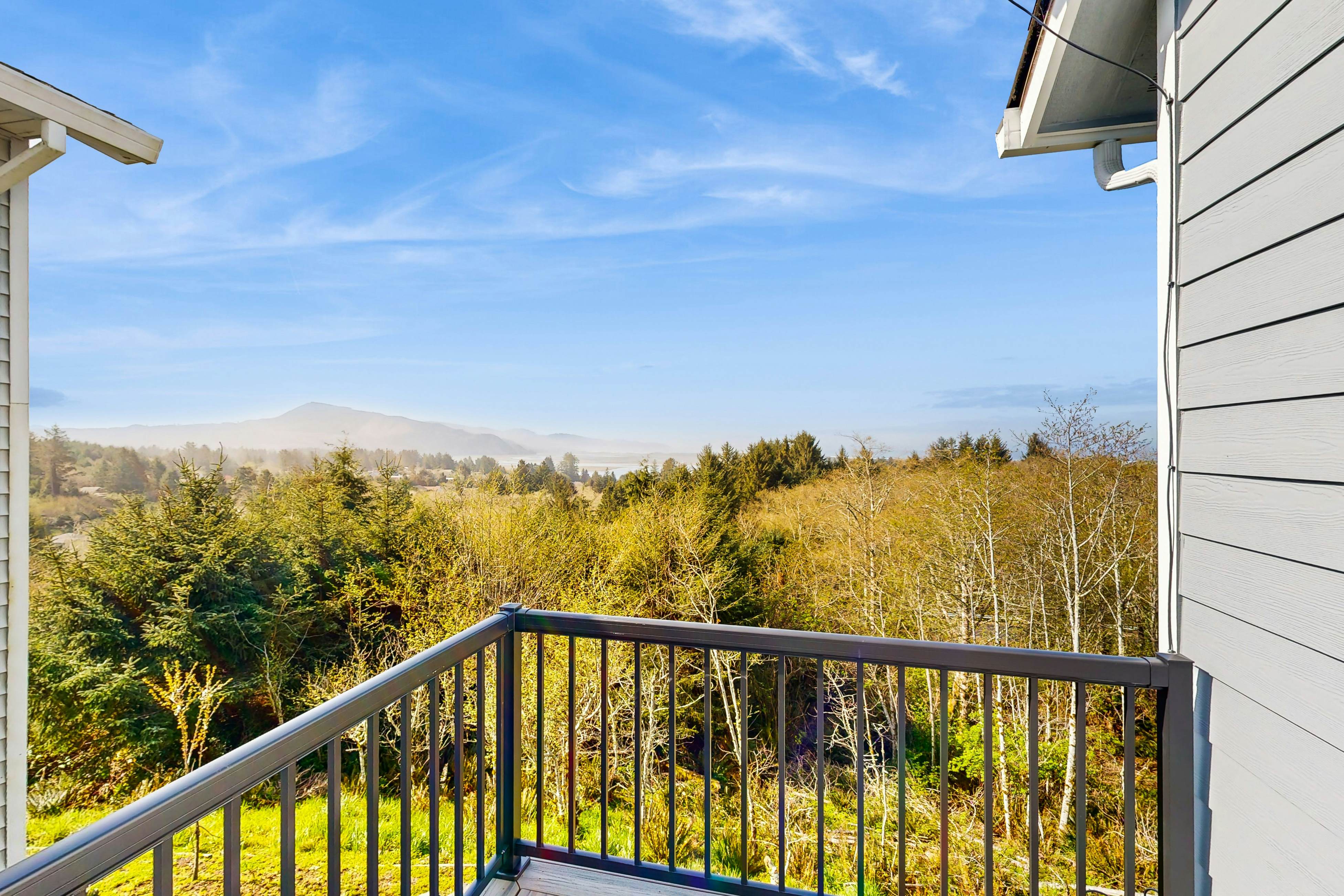 Comfortable home with ocean views with private hot tub deck fireplace WiFi