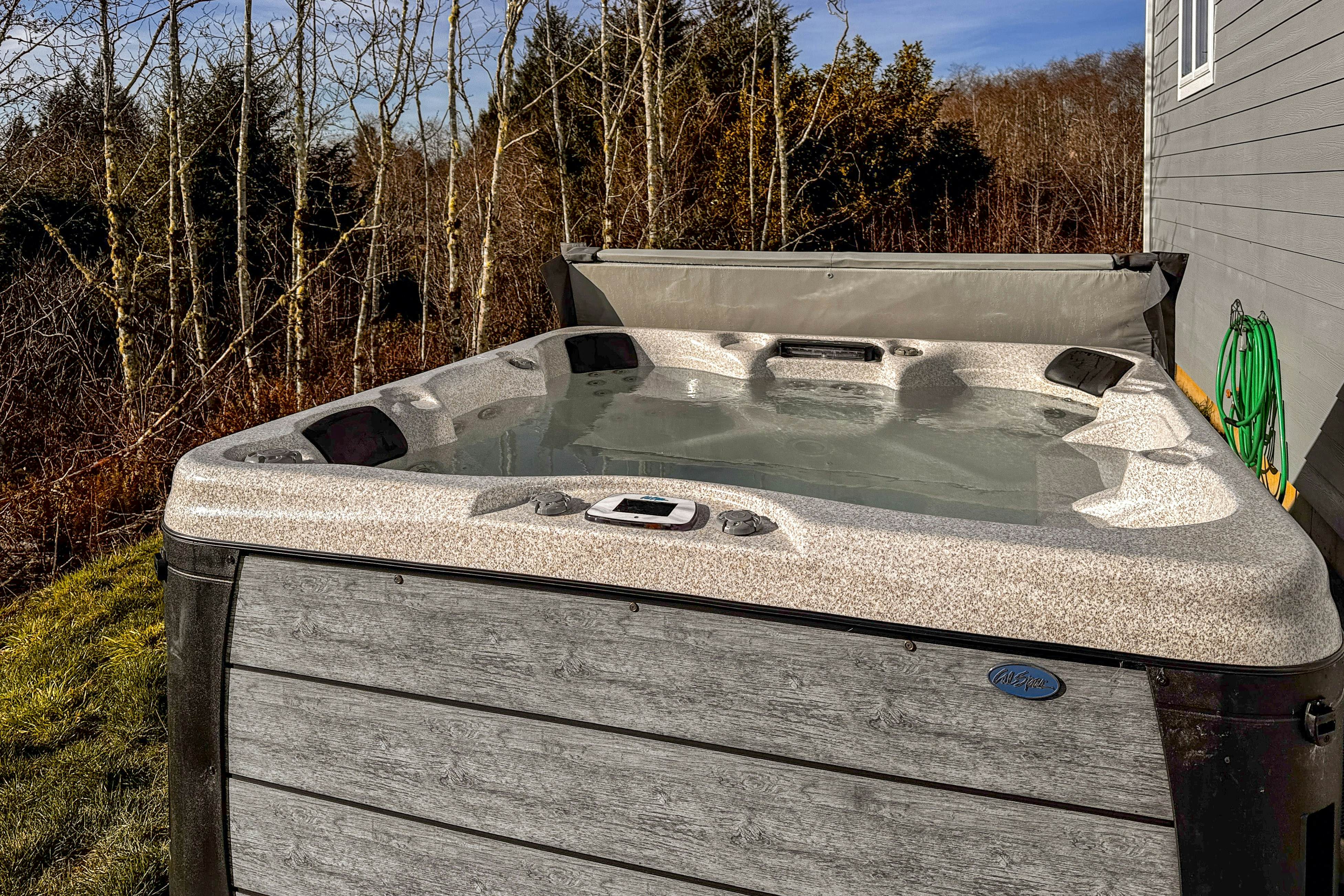 Comfortable home with ocean views with private hot tub deck fireplace WiFi