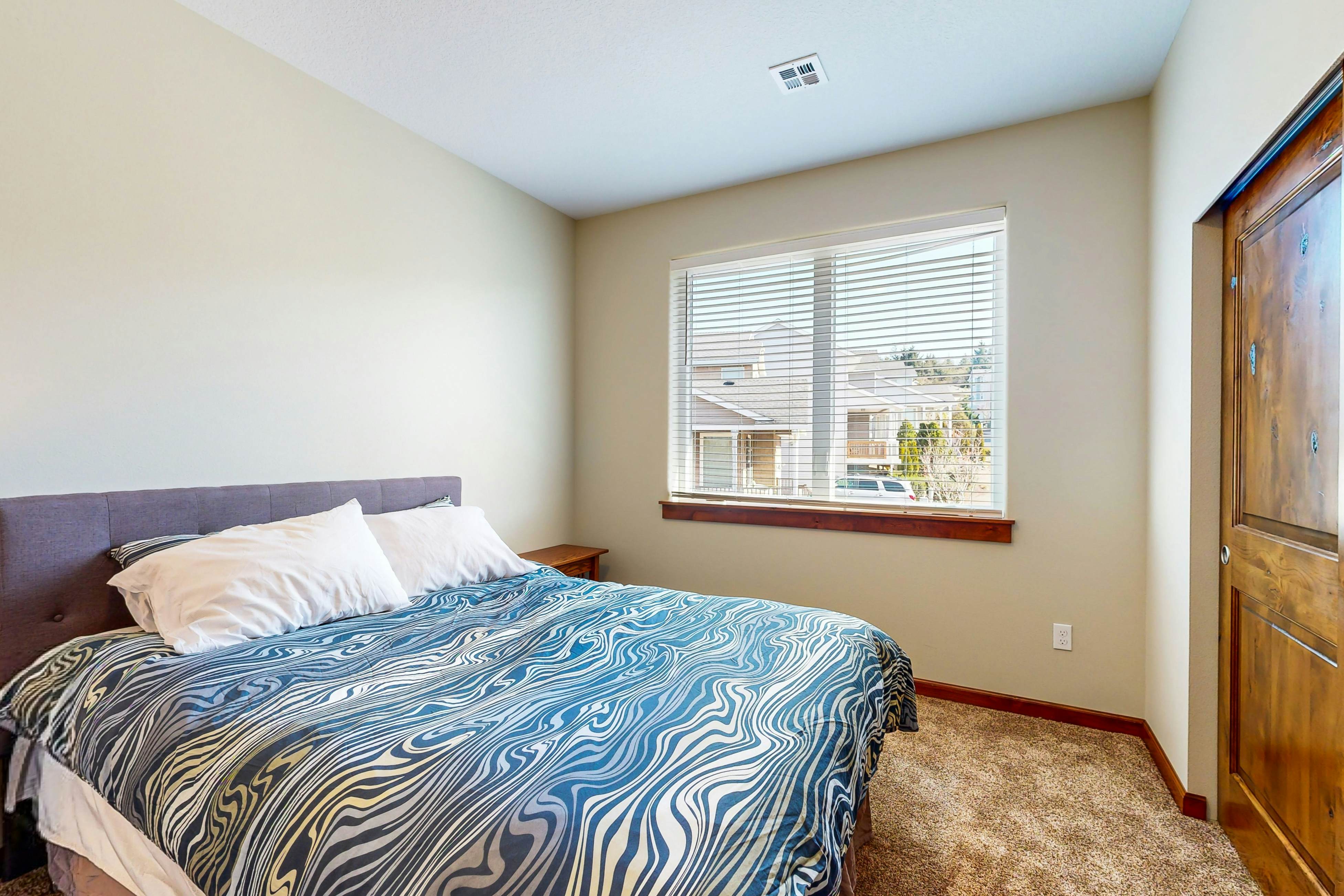 Comfortable home with ocean views with private hot tub deck fireplace WiFi