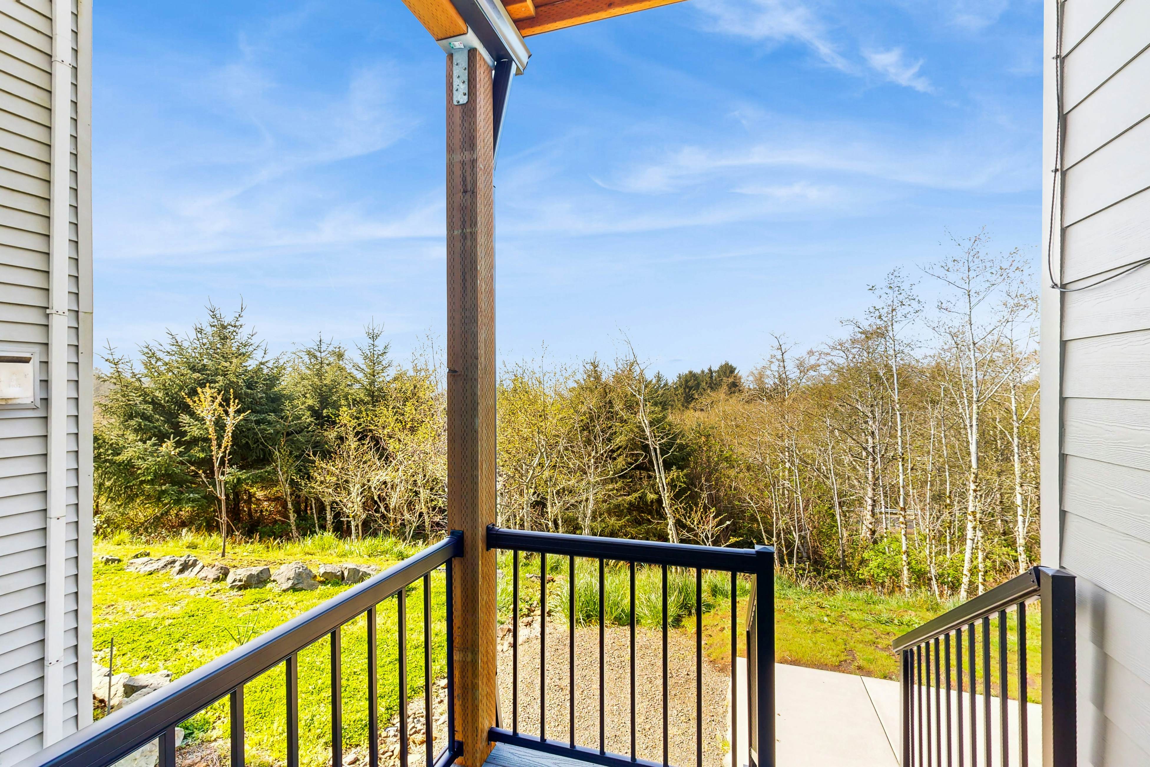 Comfortable home with ocean views with private hot tub deck fireplace WiFi