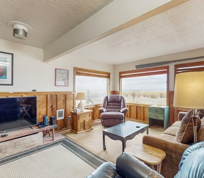 Cozy dog friendly home with ocean views beach access grill and WIFI