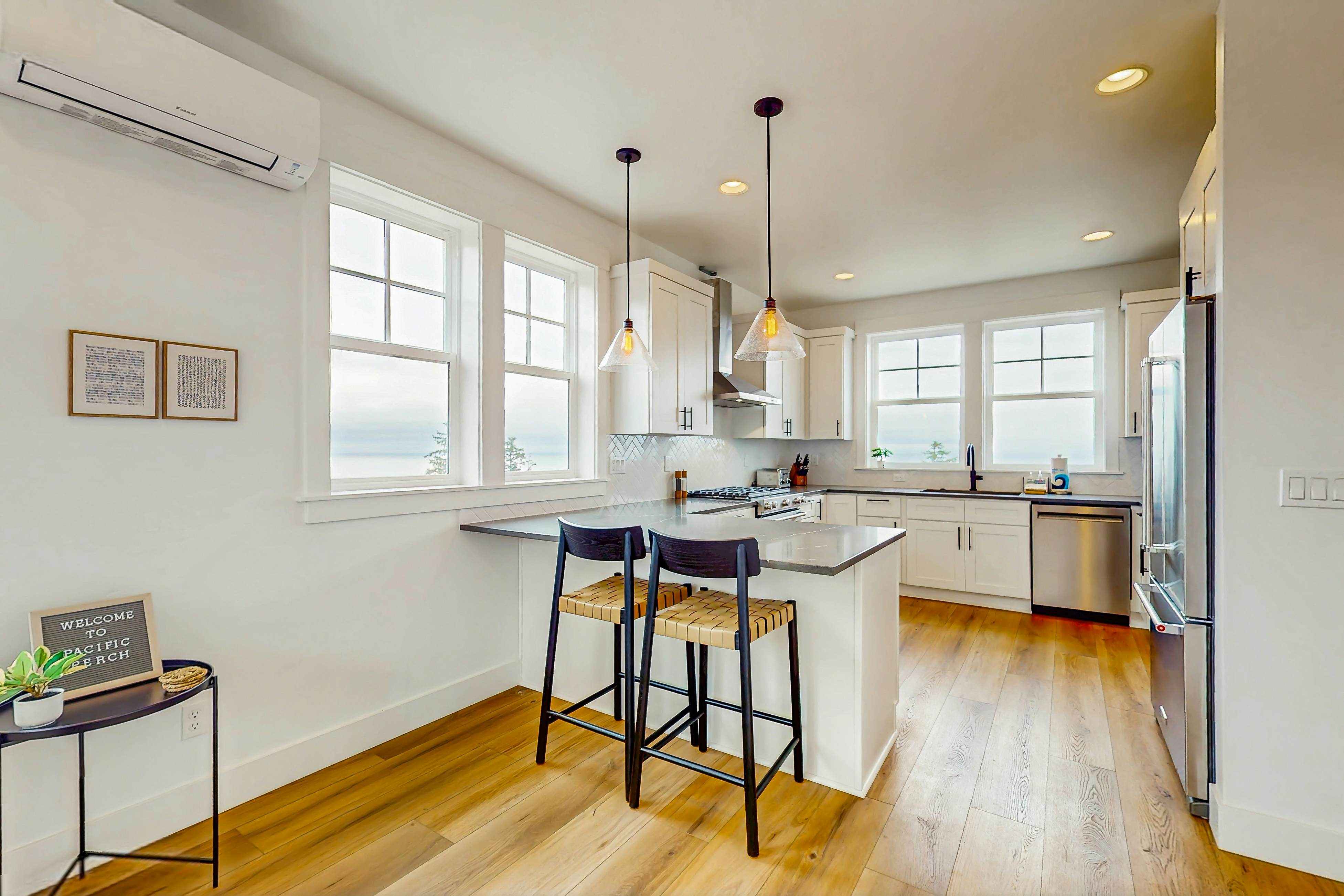 Family friendly home w/ ocean views, private hot tub, foosball table & gas grill