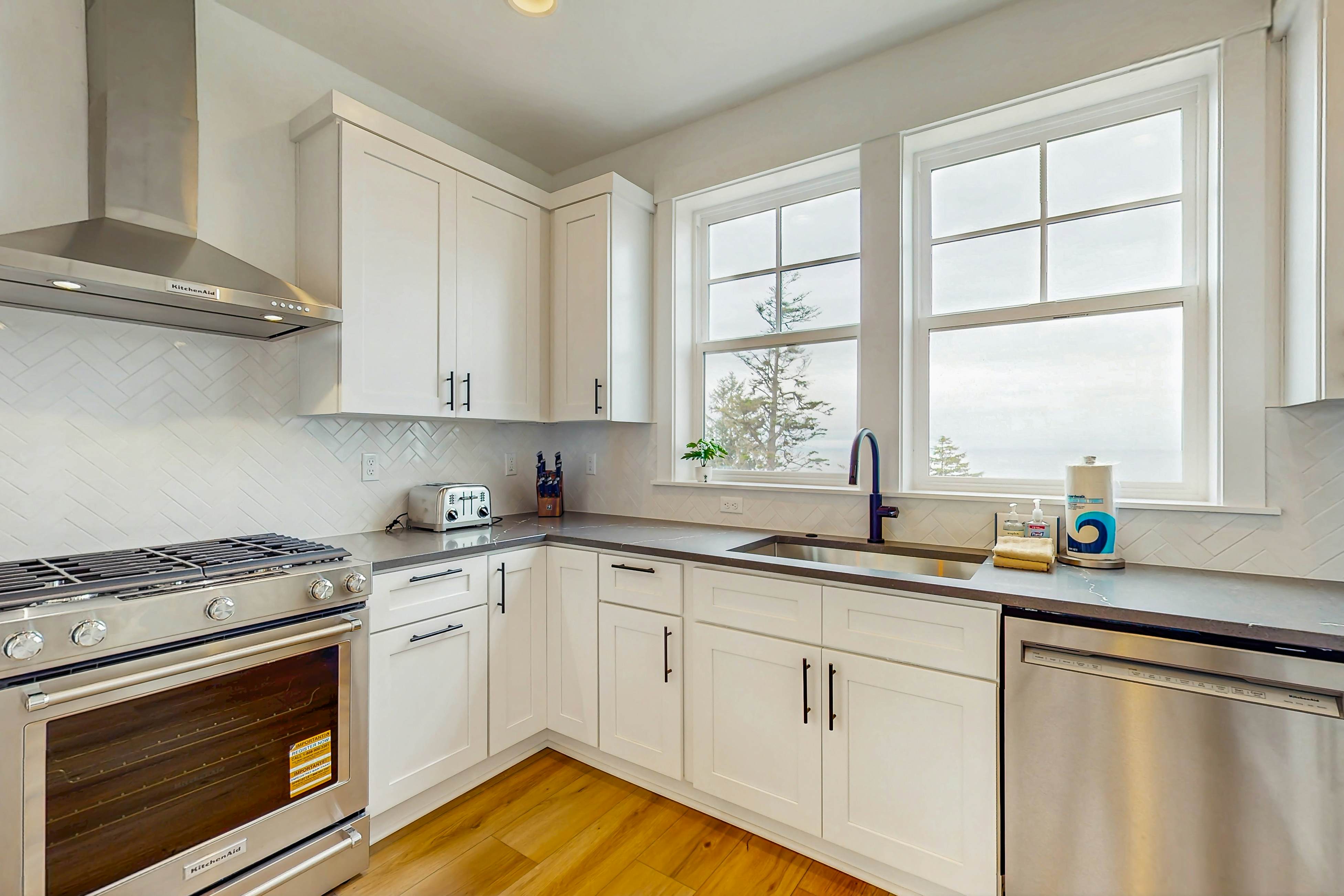 Family friendly home w/ ocean views, private hot tub, foosball table & gas grill