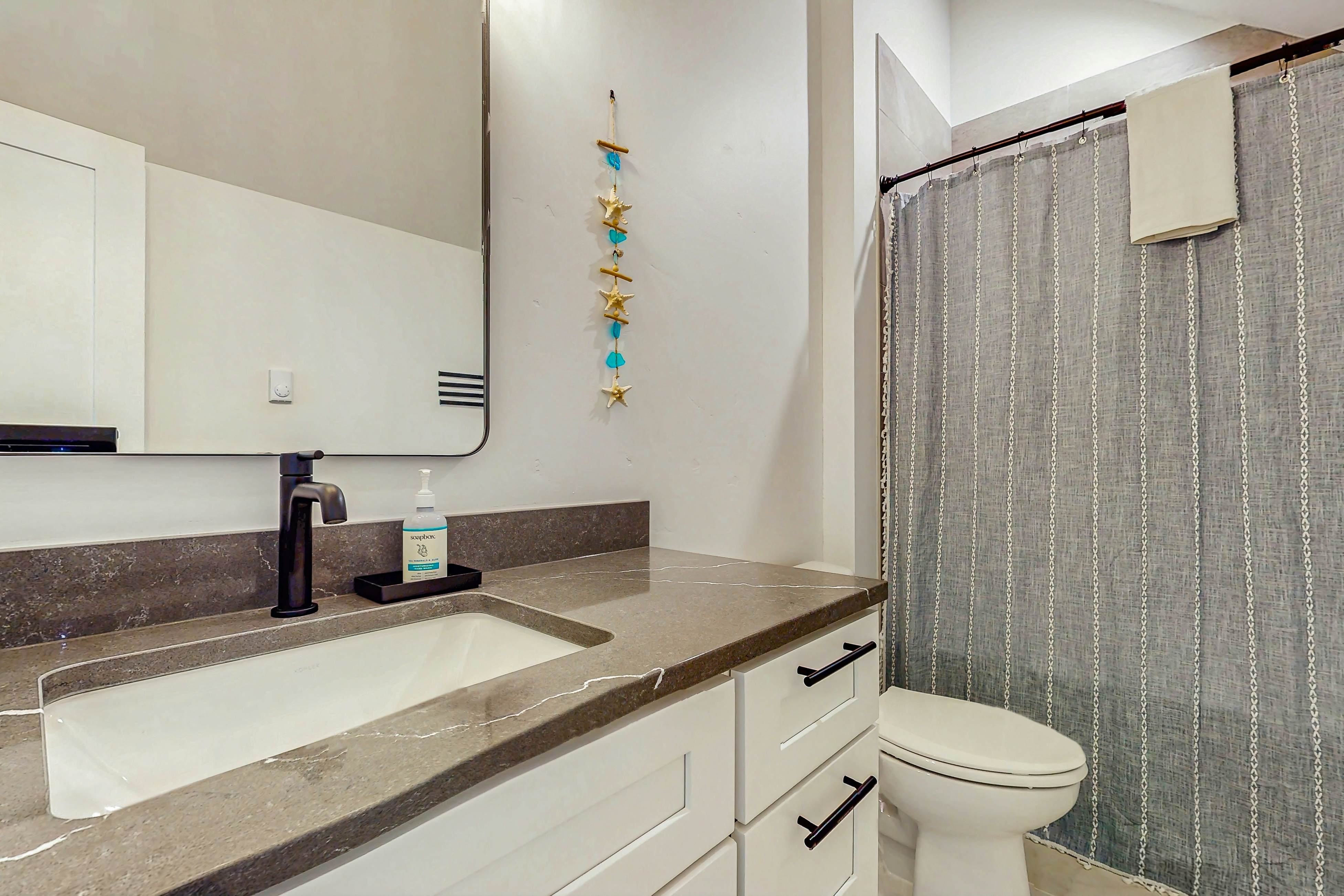 Family friendly home w/ ocean views, private hot tub, foosball table & gas grill