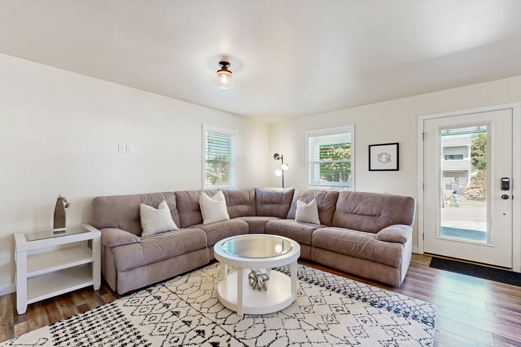 Modern Beach Cottage with a covered patio fire pit grill and easy beach access