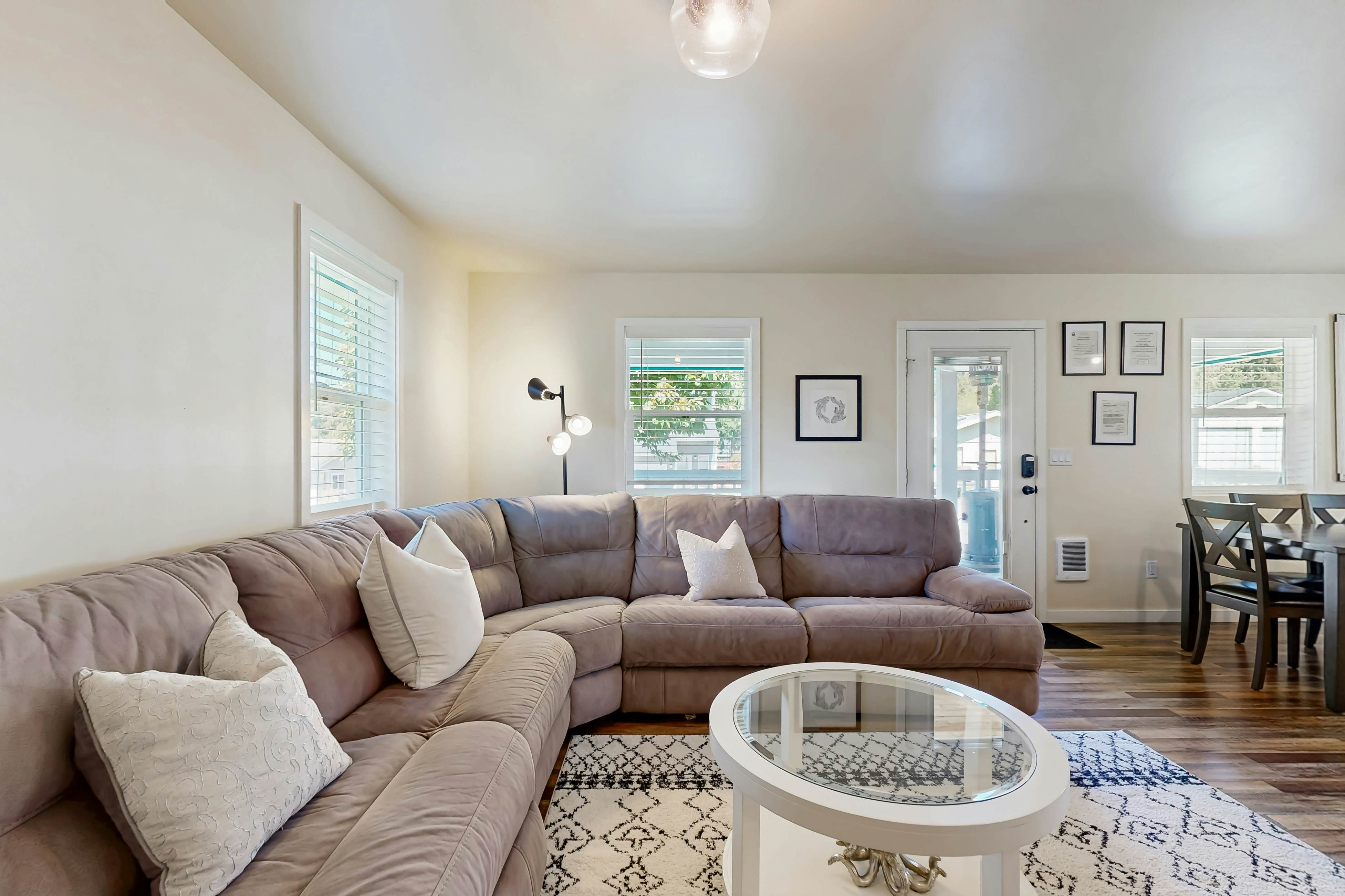 Modern Beach Cottage with a covered patio fire pit grill and easy beach access