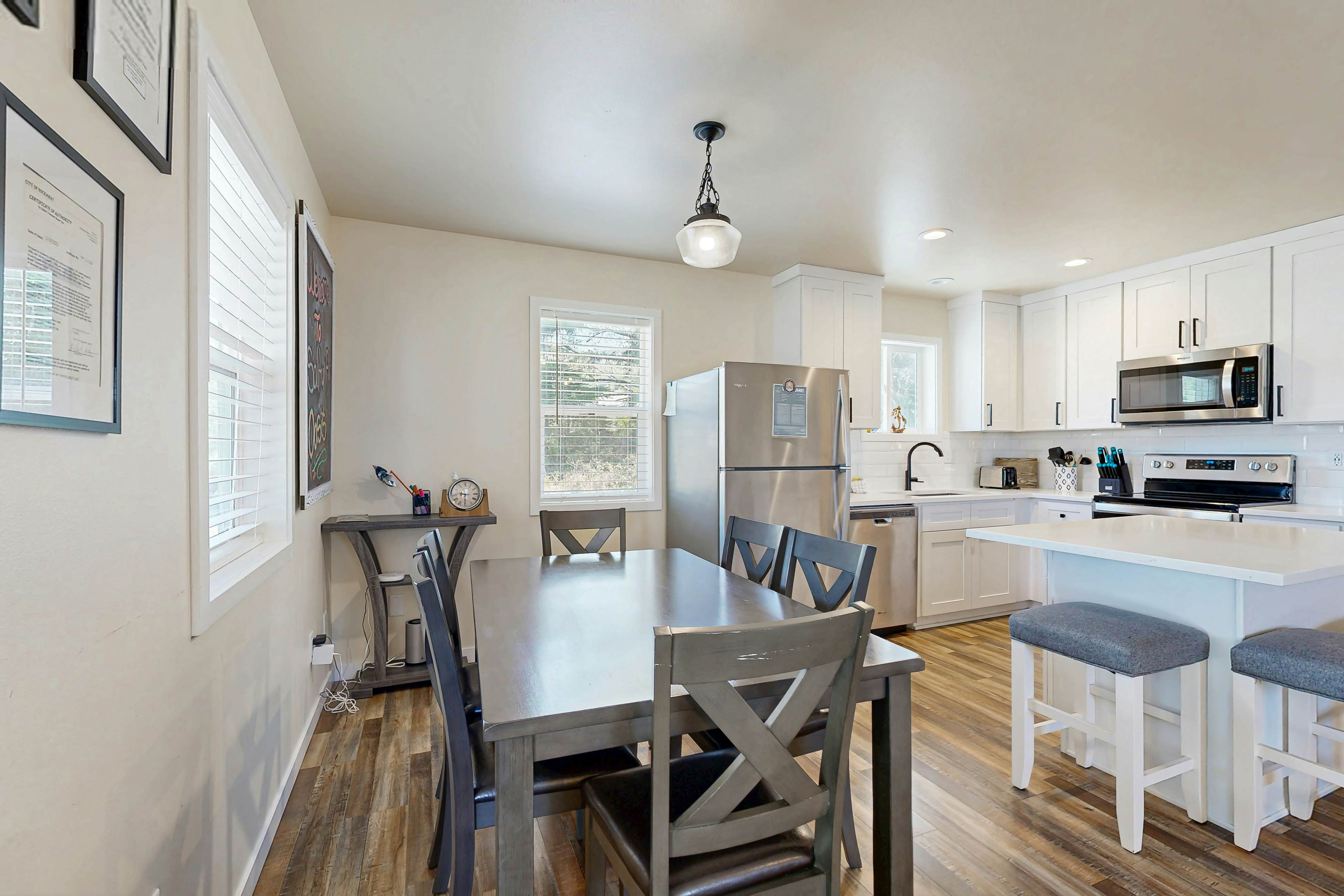 Modern Beach Cottage with a covered patio fire pit grill and easy beach access